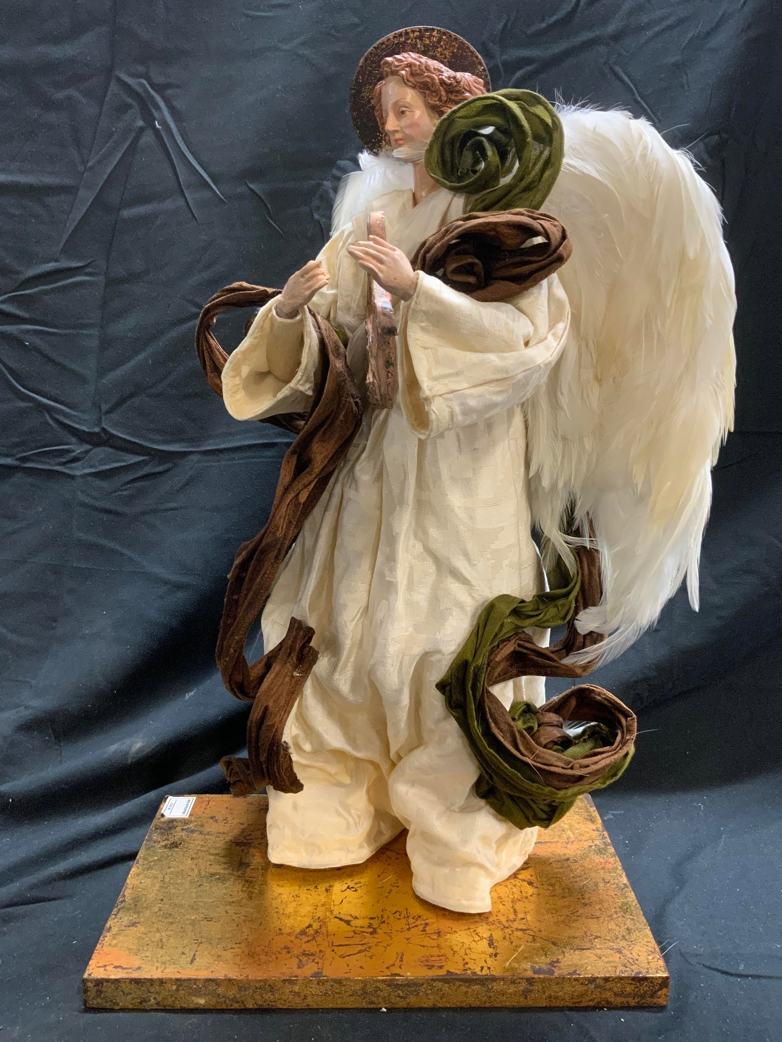 Female Angel W Lyre Figure W Giltwood Base: Female Angel figure. Piece has gilt wood base. Depicts a female angel figure dressed in white holding a lyre. Piece measures approximately 19.5 inches tall 12 inches wide at base 7 inches deep at base