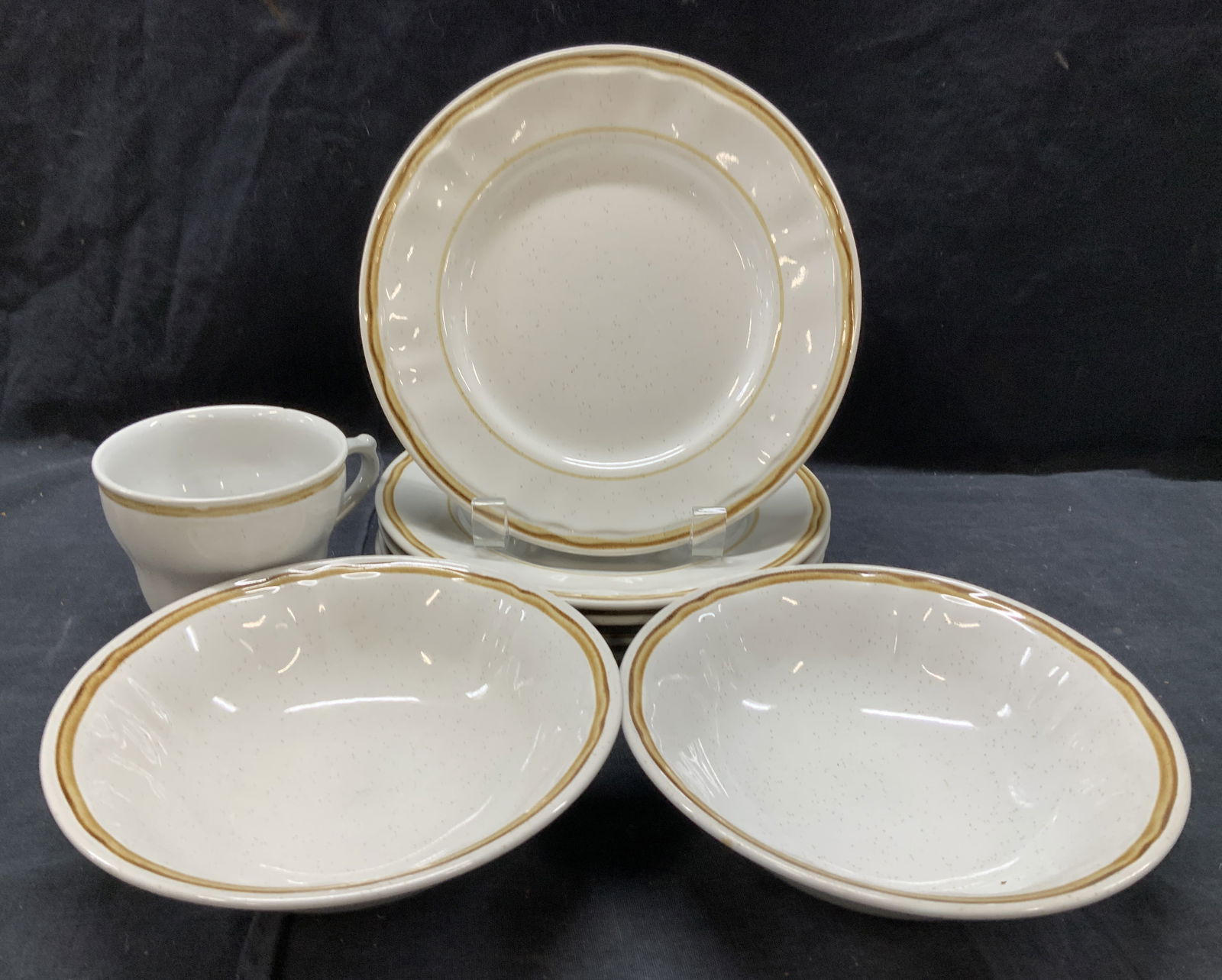Americana Hearthside Stoneware Bowls and Plates, 8: Vintage Mid century Stoneware tableware, includes 5 luncheon plates, measuring 7 1/2 in wide, 2 bowls measuring 6 1/2 in by 2 in, 1 tea cup measuring 3 in tall, 4 1/2 in with handle 3 1/2 in wide. Chi