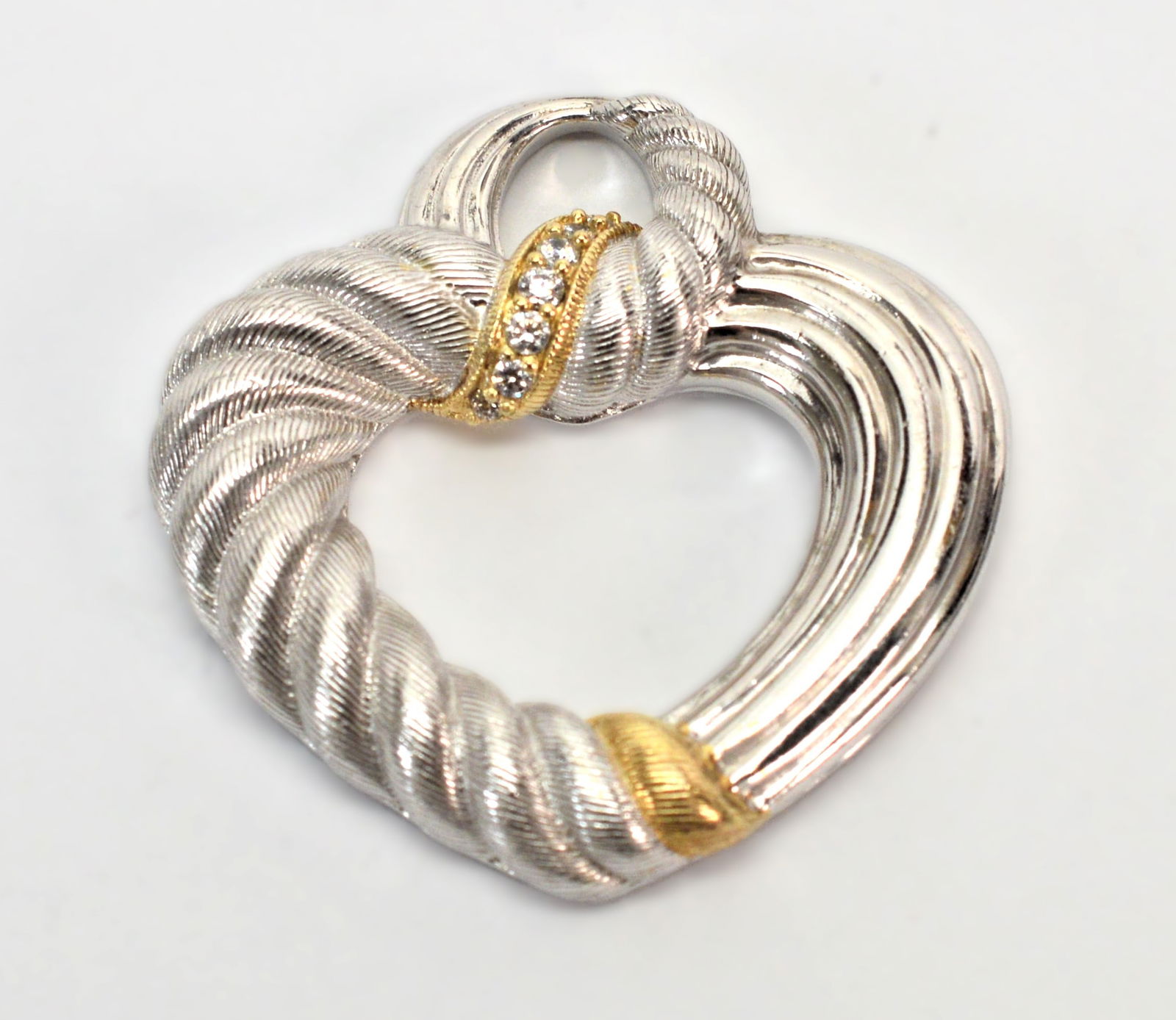 Judith Ripka Sterling Silver Gold Tone CZ Enhancer: Judith Ripka Open Heart Sterling Silver Gold Tone Cubic Zirconia Enhancer Beautiful high polish and brushed sterling silver open heart enhancer to hang on cording (not included). Gold tone and Cubic Z