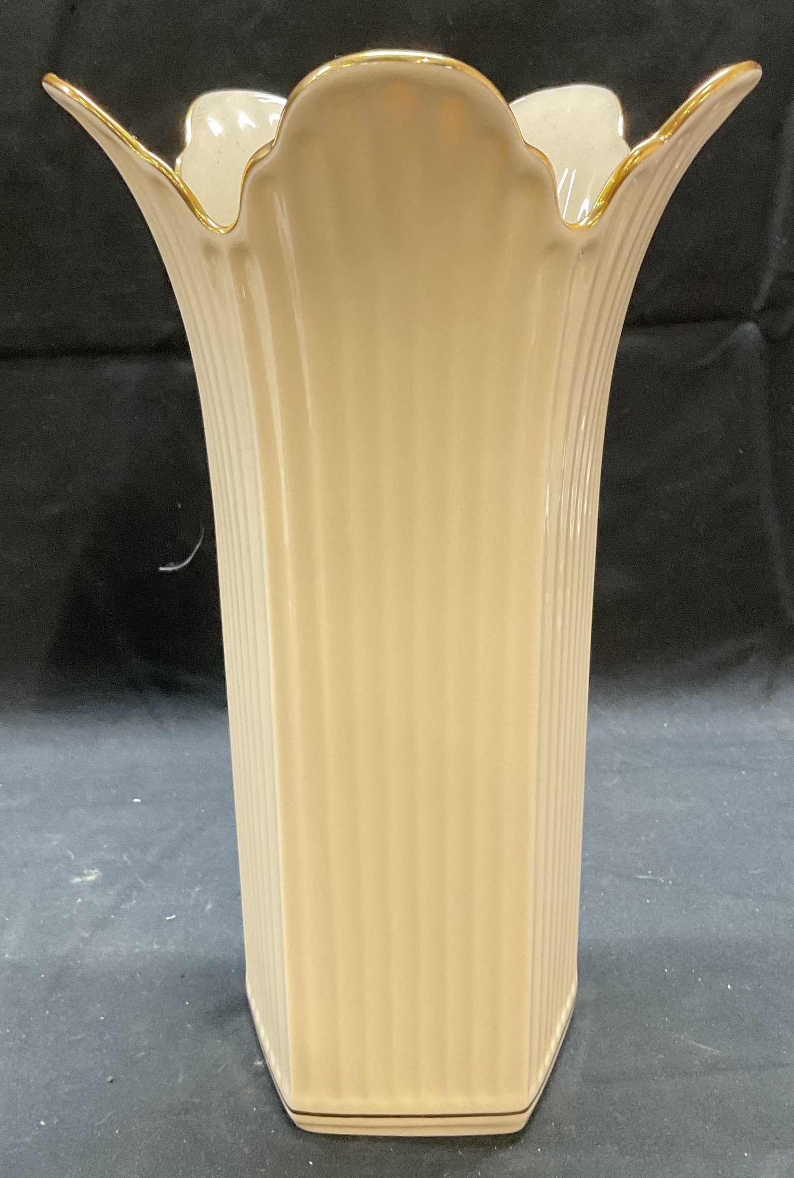 Lenox Meridian Gilt Porcelain Scalloped Vase: Lenox Meridian gilt porcelain vase with scalloped and ribbed design. Signed on underside. Measures approx. 6.75 x 11 inches. Some surface wear consistent with exposure. Lenox, Lenox meridian, Lenox va