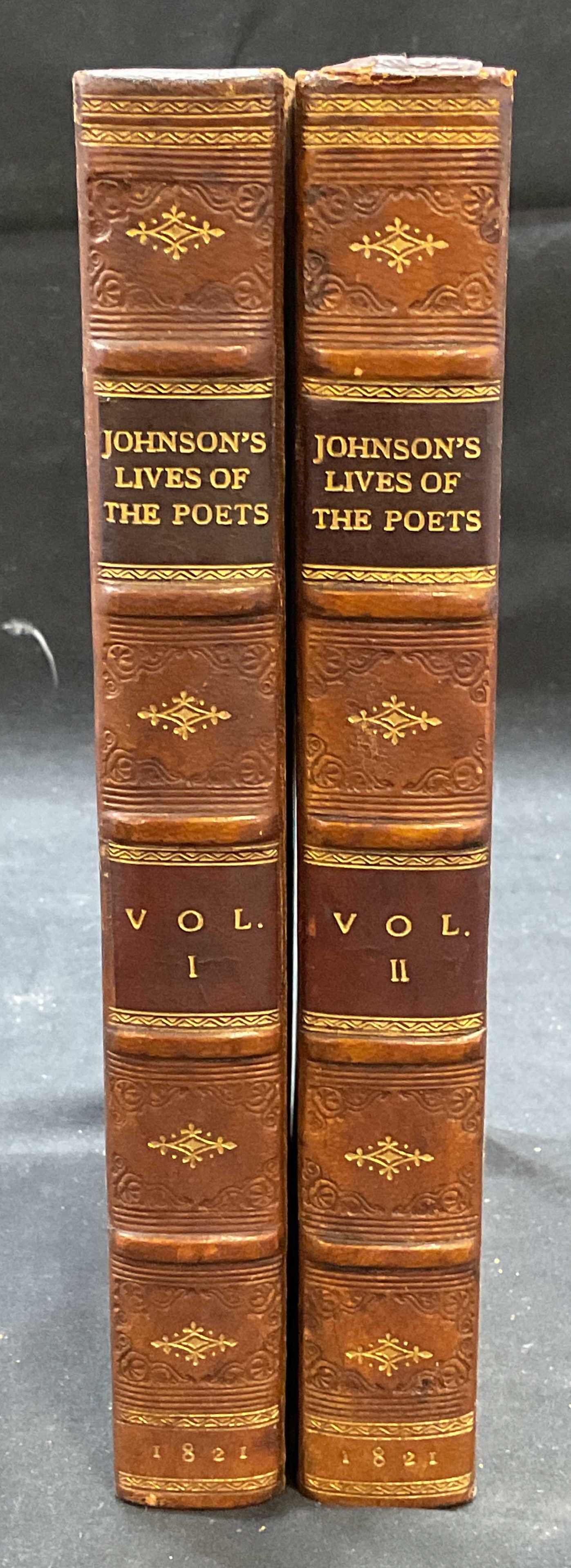 Antique Johnsons Lives of Poets Vol 1&2 1821: Antique hardcover leather bound copies of The Lives of the Most Eminent English Poets by Samuel Johnson, L. L. D. volumes 1 and 2. Published 1821. Measures approx . 8.5 x 5.5 inches each. Both books h