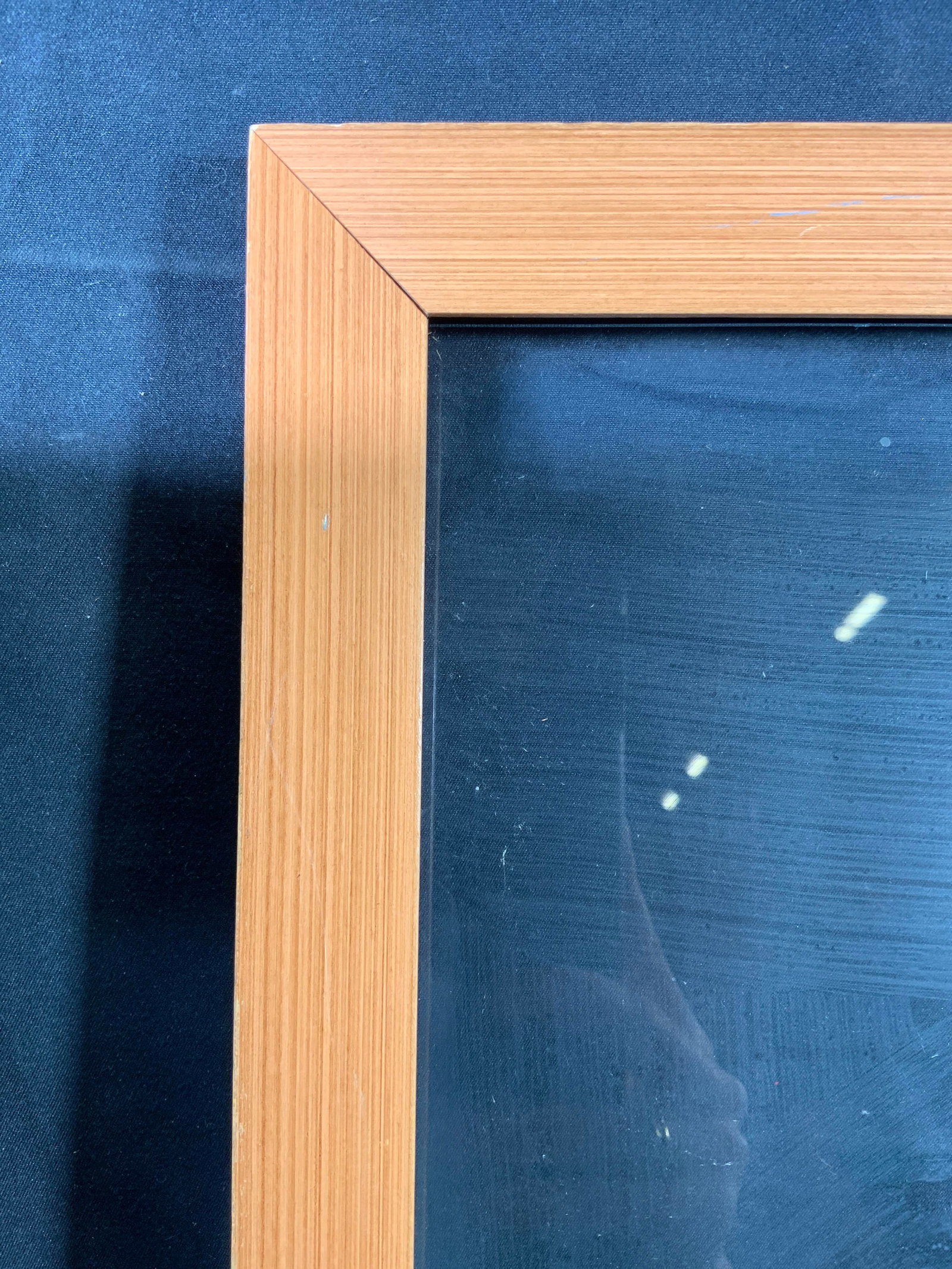Tan Wooden Picture Frame With Glass Panel: Tan wooden picture wall frame. Includes glass panel. Frame measures approx. 13.5 W x 17.5 H in. Window measures approx. 11.5 W x 15.5 H in. Not viewed hanging. Minor wear to frame. Wall hanging, Pictu