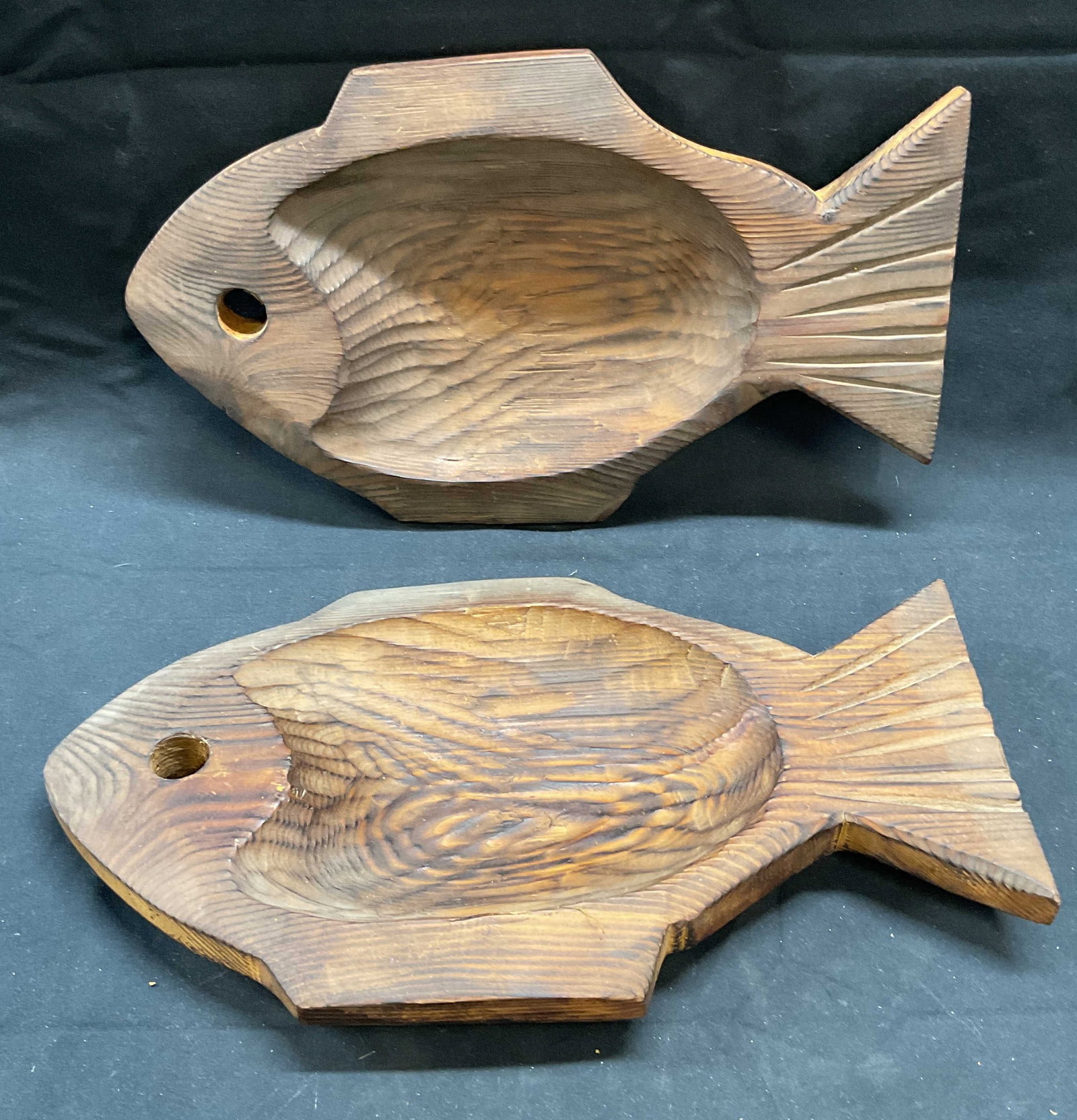 Pair Vtg Hand Carved Wood Fish Platter, Poland: Pair of vintage hand carved wooden fish motif platters. Labeled in Polish to underside of one piece. Made in Poland. Measure approx. 12.5 x 7.25 inches each. Both pieces have some surface wear includi