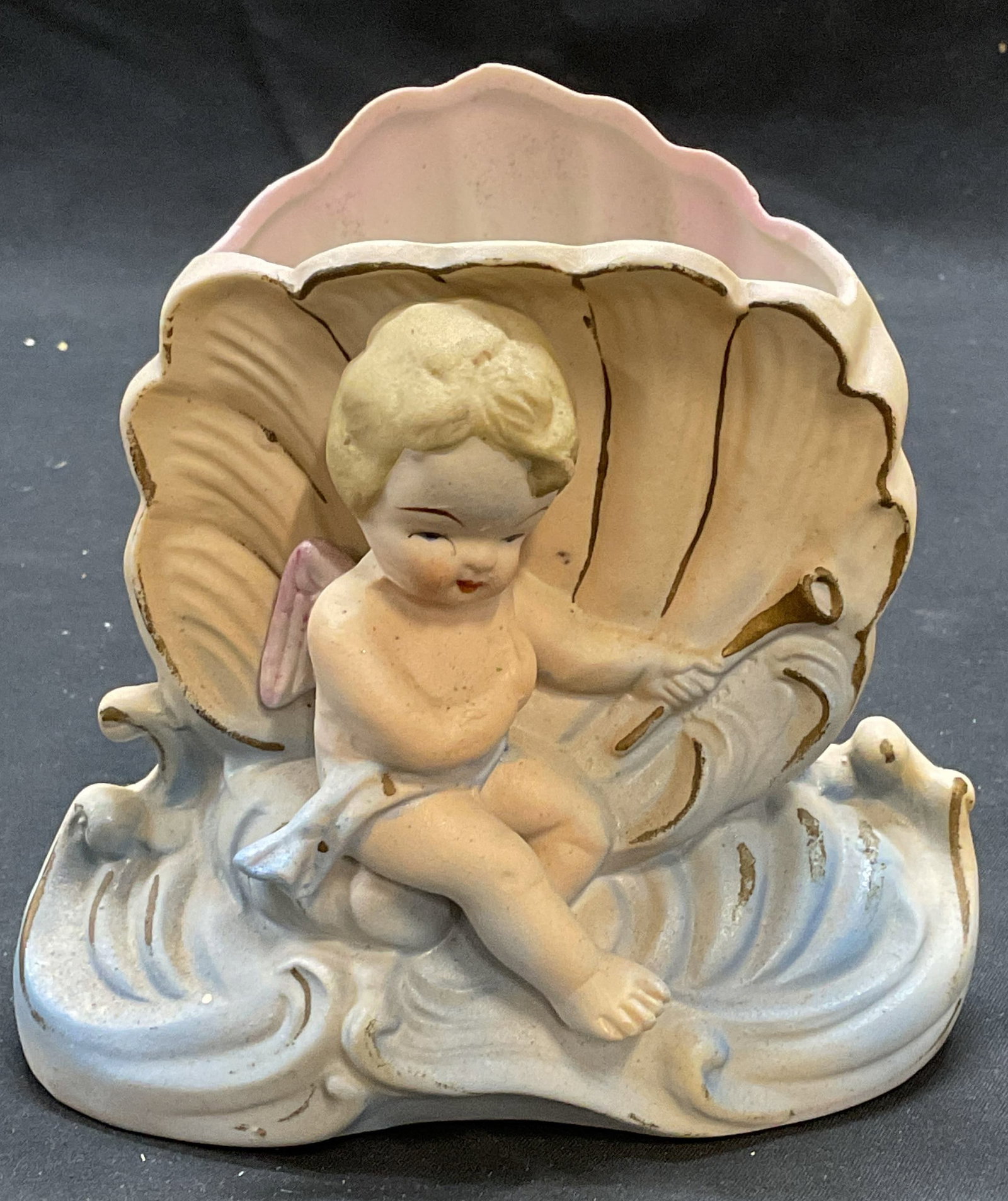Vtg Porcelain Cherub Shell Planter Vase, Japan: Vintage porcelain cherub and shell motif planter/vase. Made in Japan. Hand painted. Measures approx. 5 x 2.5 x 5 inches. Some surface wear including scratching and small chips observed. Porcelain plan