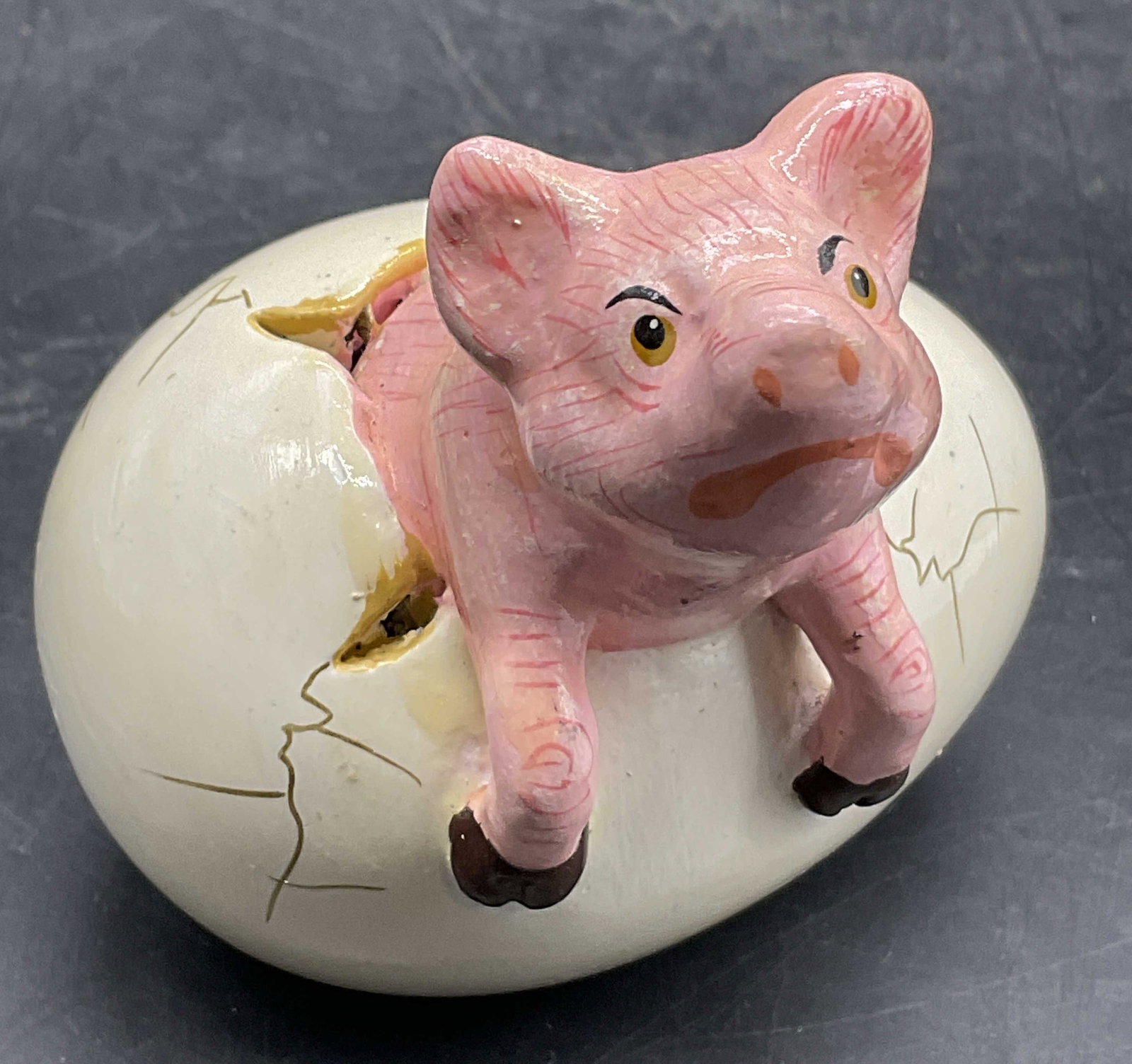 R. MIRANDA Pig Hatching From Egg Figural, Mexico: Hand painted figural depicting a pig hatching from an egg. Side signed R. MIRANDA, MEXICO. Measures approx. 3H x 2.75W in. Measured at widest point. Discoloration and surface wear present. home decor,