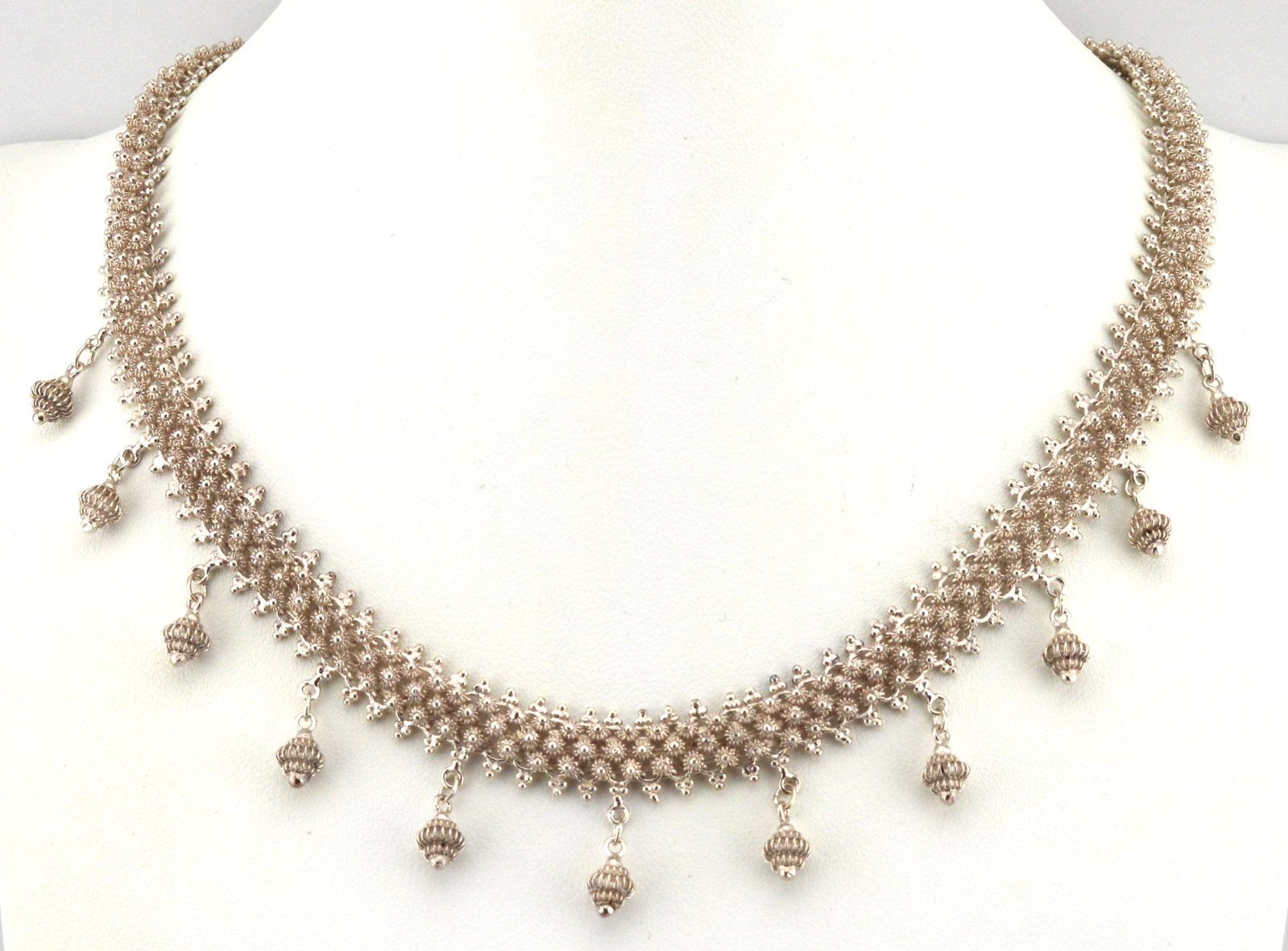 Sterling Silver Necklace New: Sterling silver 15 IN necklace with .5 IN bead drops. Hook closure.NEWBS22 J