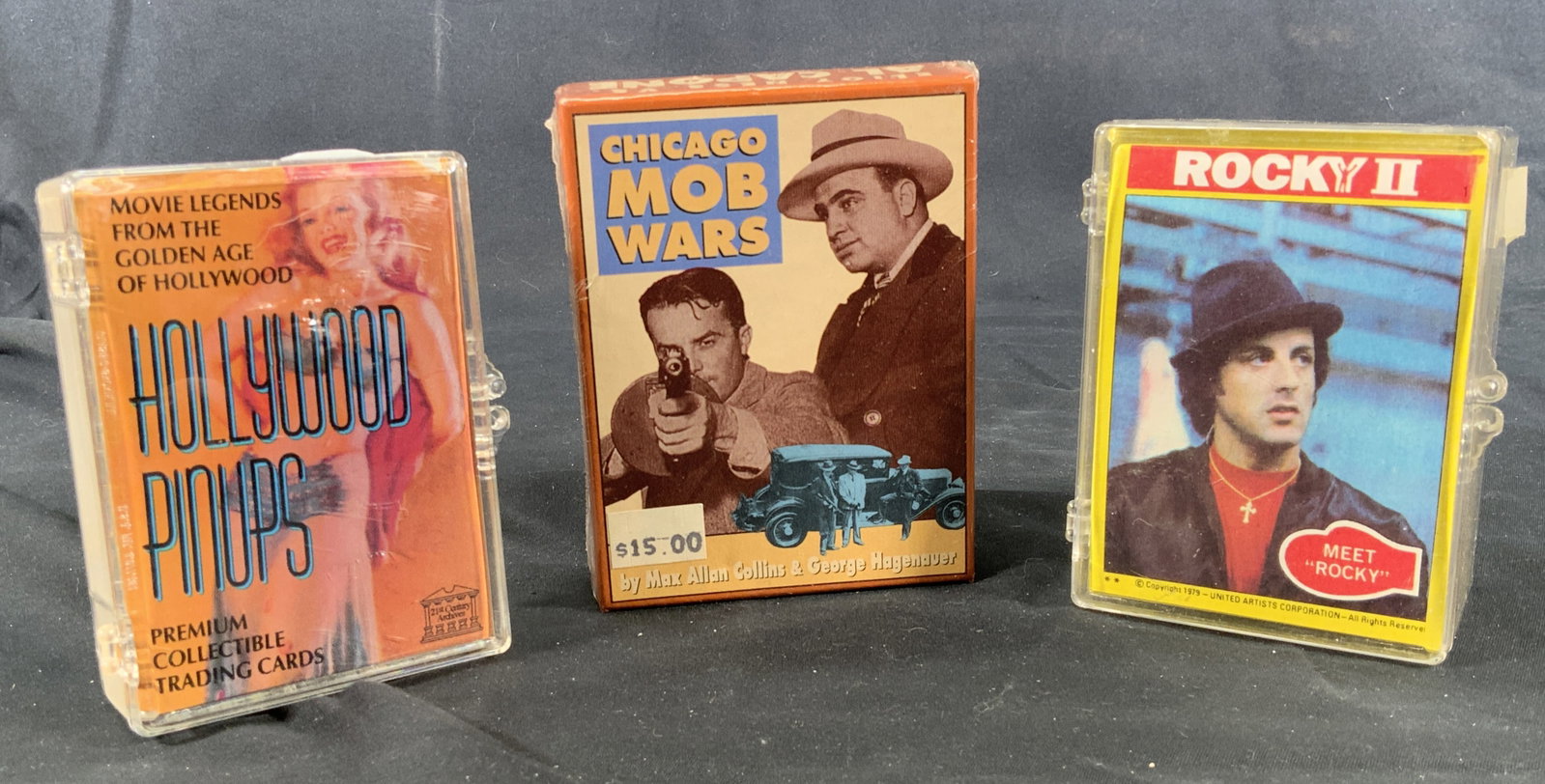 Lot 3 Vintage Hollywood Trading Card Packs: Lot 3 Packs of Assorted Hollywood trading cards. Hollywood pinups, premium collectible trading cards, by 21st century archives. Chicago Mob Wars trading cards by Max Allan Collins & George Hagenaver. 
