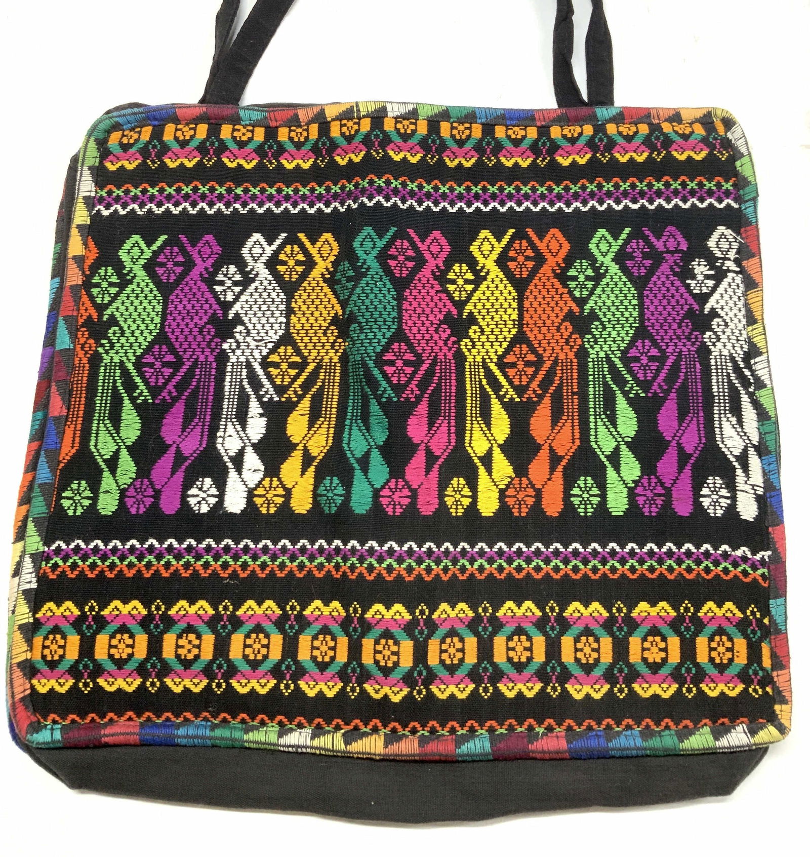 Hand Crafted Embroidered Cotton Tote Bag: Black cotton hand bag with embroidery, padded between exterior and interior fabric. Zipper closure. Handle drop is 15 in. Bag measures 17.25 in. Wide x 14.5 in ht. Appears never used. Hand crafted tot