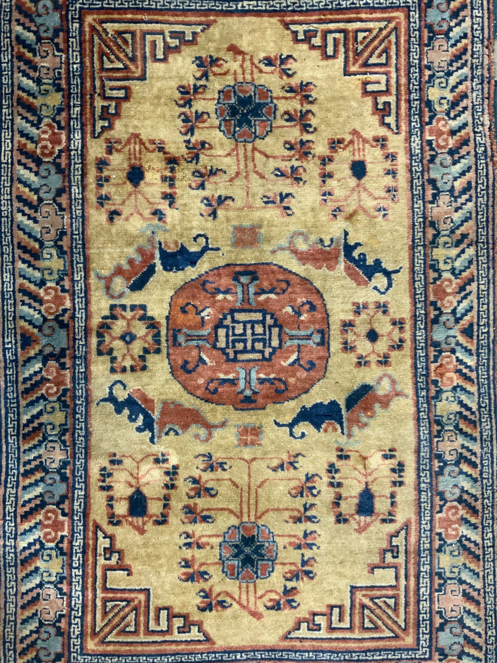 Antique Handmade Fringed Persian Wool Rug: Rug is handmade and wool. Piece appears to be antique possibly vintage. Rug has short tan toned fringes. Piece has intricate multi toned floral and geometric detail. Rug measures approximately 47 inch