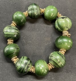 Signed LC Gold Tone Green Beaded Bracelet
