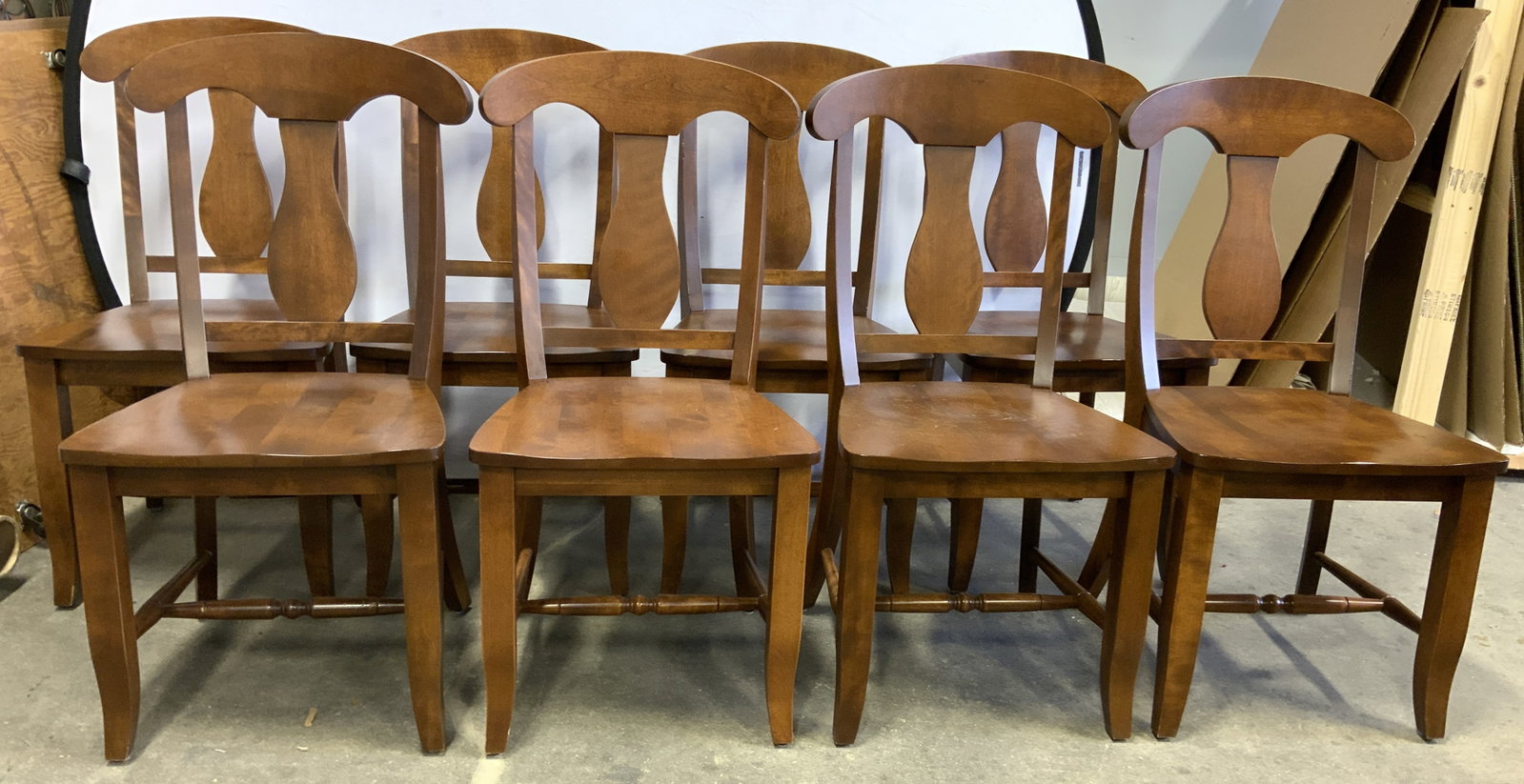 USINE Set 8 Wooden Dining Chairs: Tags on undersides read USINE. Each chair is brown toned & wooden. Chairs each have H form stretchers in between legs. Each chair measures approximately 37 inches tall 19 inches wide, 22 inches deep. 