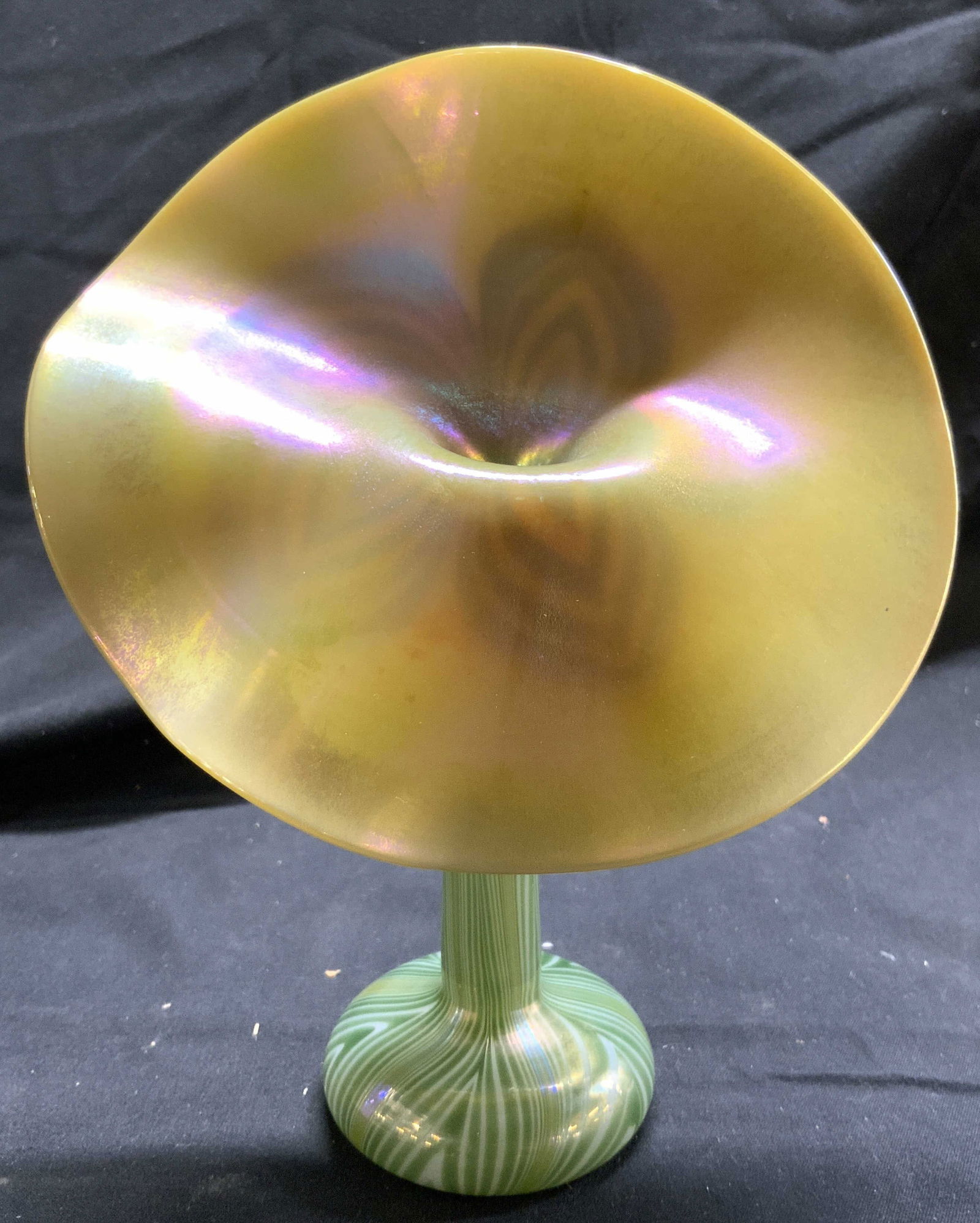 Iridescent Art Glass Jack in the Pulpit Vase: Vintage carnival art glass jack in the pulpit vase, iridescent multicolor gold, green, white and purple glass with feather pull design. Measures approx. 7 inches tall x 5.75 inches wide. Piece has wei