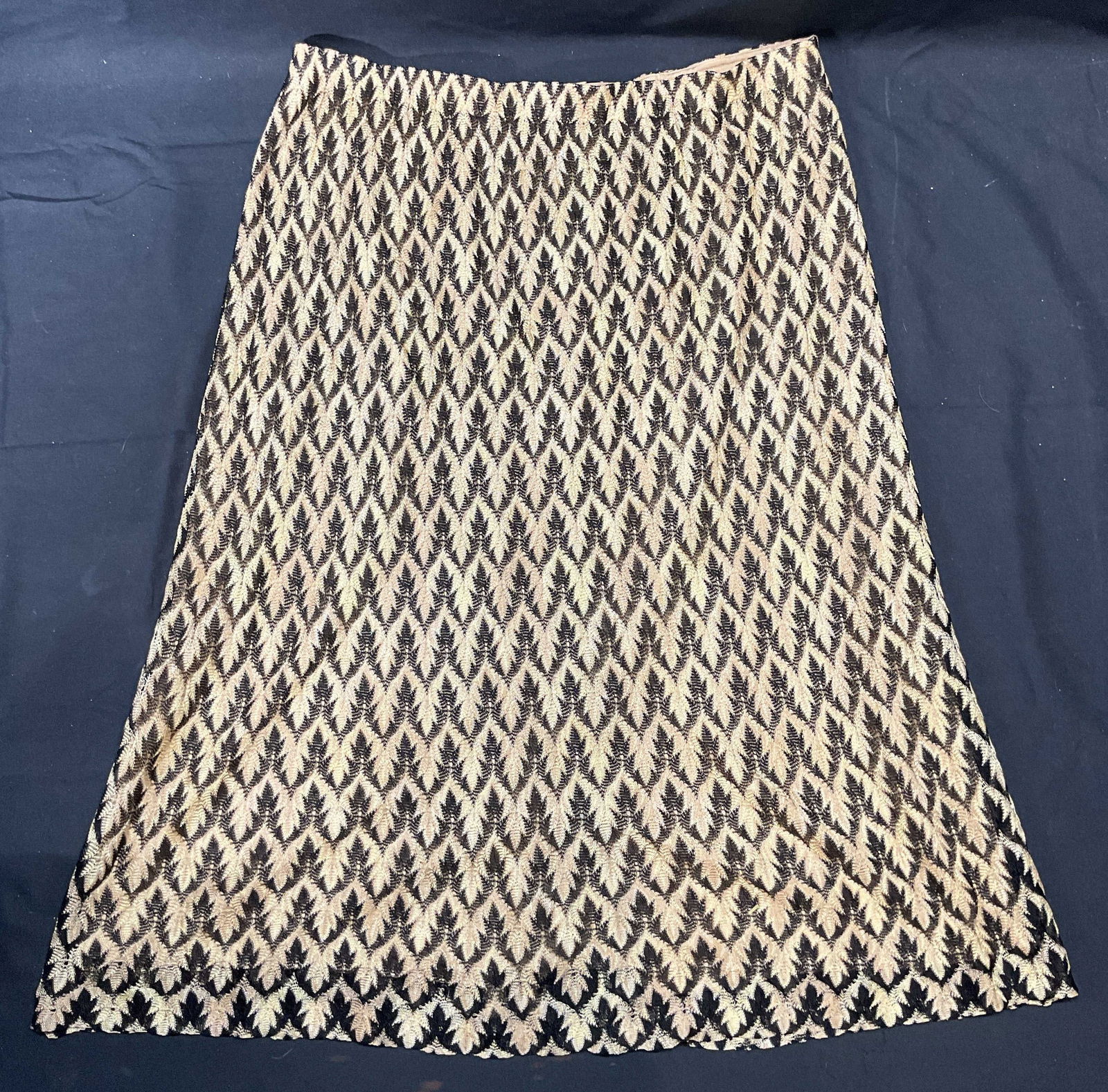 MISSONI Black Beige Patterned Skirt, Italy: MISSONI black and beige graphic pattern knit skirt. Fully lined. Back vent. Size 46. Made in Italy. 100% rayon. Gently worn. MISSONI, MISSONI skirt, ladies luxury fashion, ladies luxury skirt, ladies