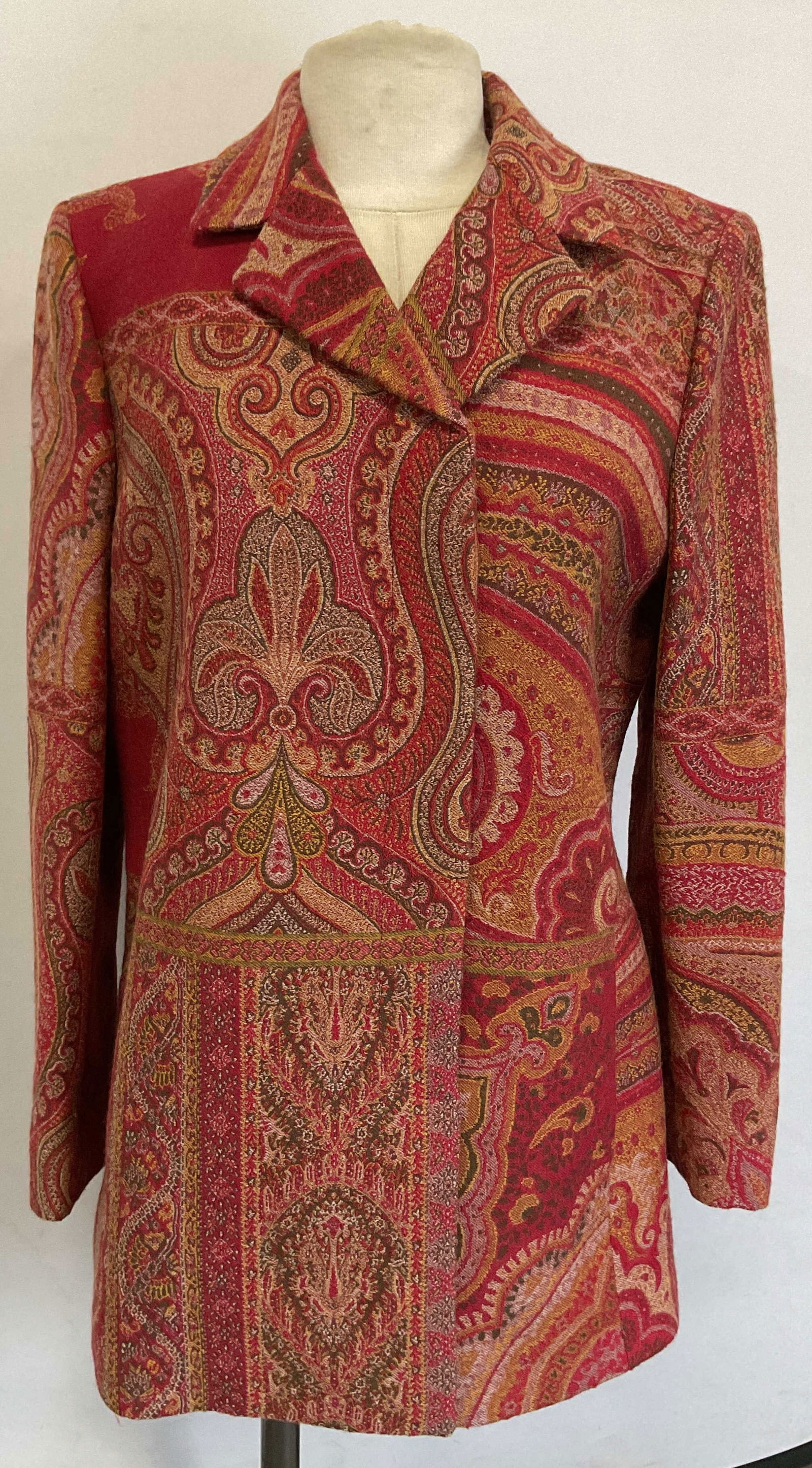 ETRO Red Paisley Wool Coat, Italy: ETRO red multicolor paisley pattern wool coat. Front button and outer pockets. Fully lined, synthetic material. Size 42. Made in Italy. Gently worn. ETRO, ETRO coat, ladies luxury coat, ladies luxury