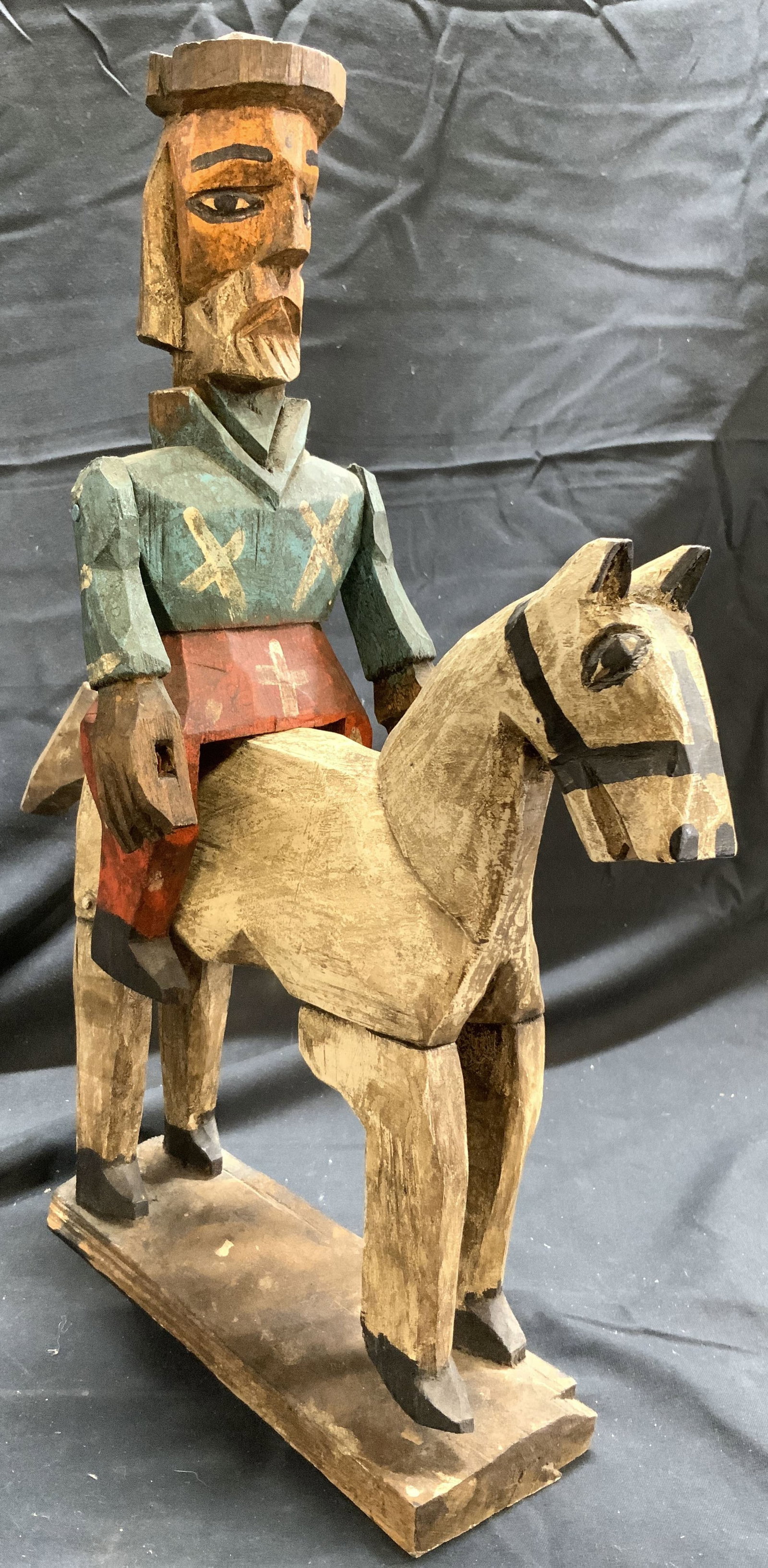 Santos St James The Apostle Wood Folk Art Hrs Ridr: Santos St James The Apostle. Figure depicts a male figure riding a horse. Piece is vintage, appears to be wooden. Figure appears to be hand painted. Piece measures approximately 11.5 inches deep 14 in
