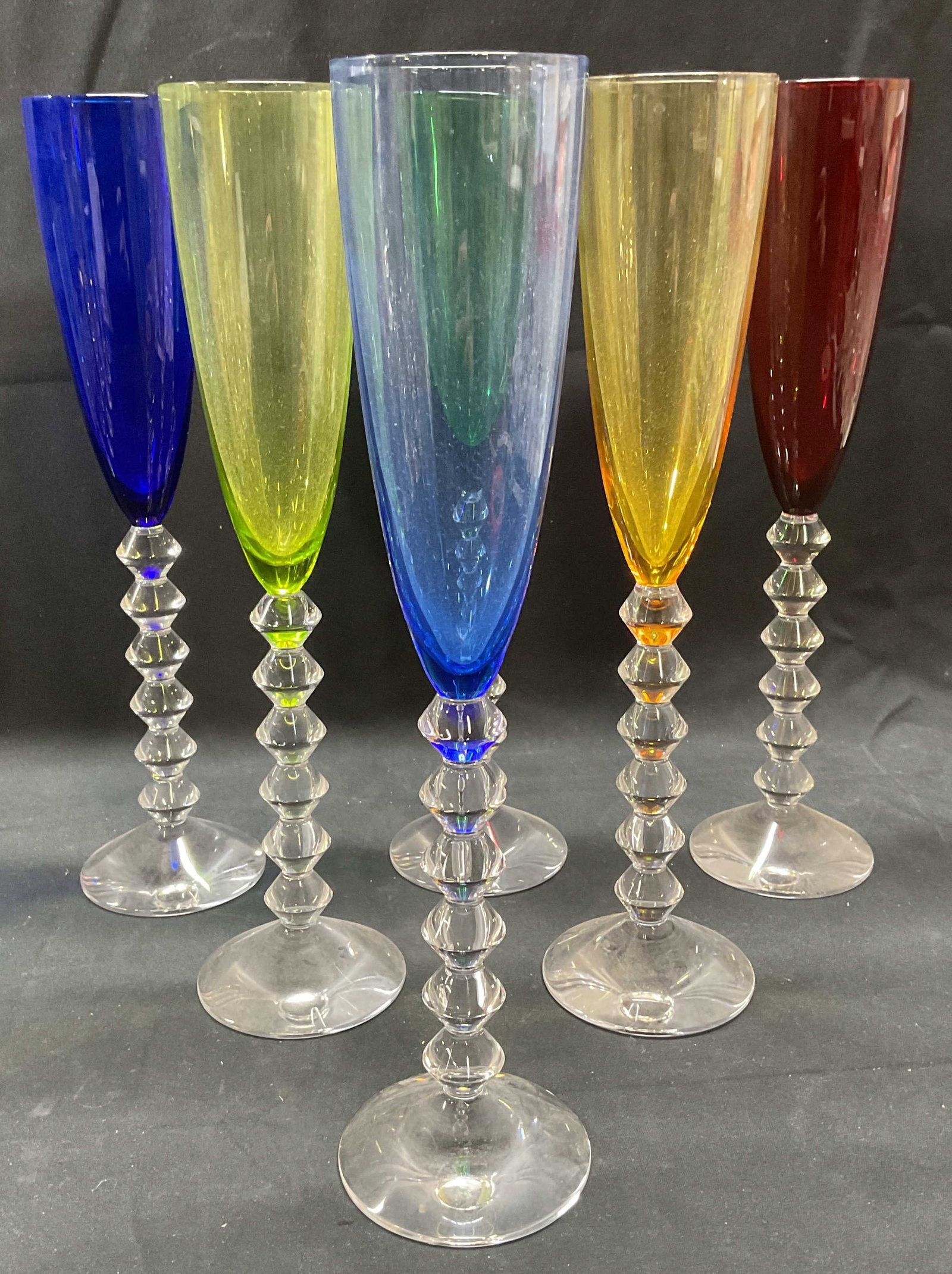 6 Baccarat Crystal Vega Champagne Glasses, France: Set of 6 Baccarat crystal Vega wine glasses. Colored crystal flutes. Diamond shaped zigzag stems. Signed on bases. Made in France. Measure approx. flutes measure approx. 2.25 inches wide, glasses appr
