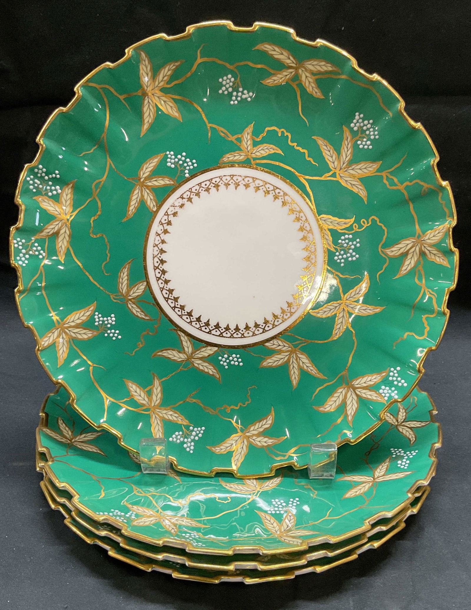 Set 4 Vtg Copeland A. T. Wiley & Co Green Plates: Set of 4 vintage, possibly antique, Copeland China for A. T. Wiley & Co, Montreal, plates. Made in England. Signed on undersides. Green with gilt decoration and botanical pattern. Measure approx. 8.75