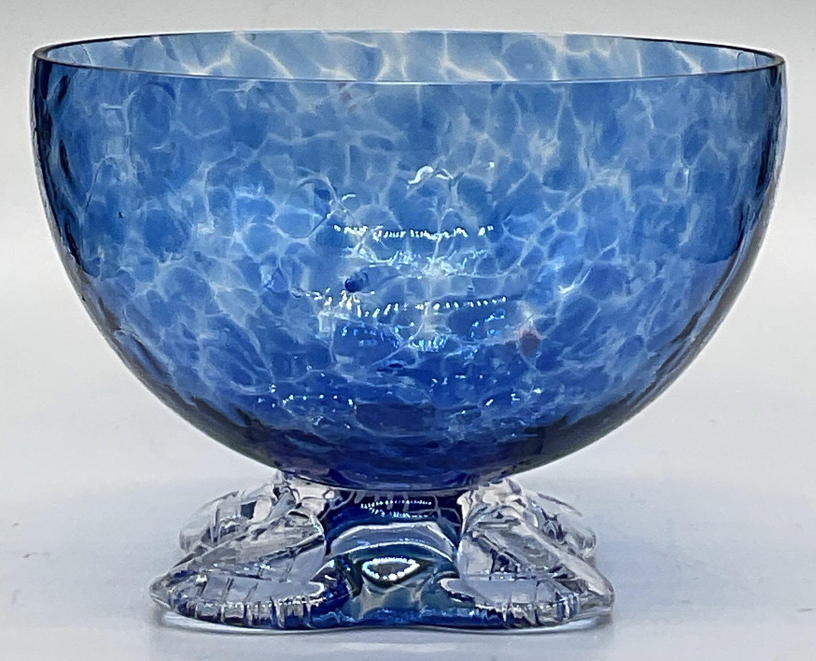 2003 Signed Hand Blown Art Glass Footed Bowl: Hand Blown Art Glass Footed Bowl. Speckled blue and clear glass hues. Underside of foot signed illegibly and dated 2003. Measures approx. 3.5H x 5W in. Chipping and surface wear present. home decor, h