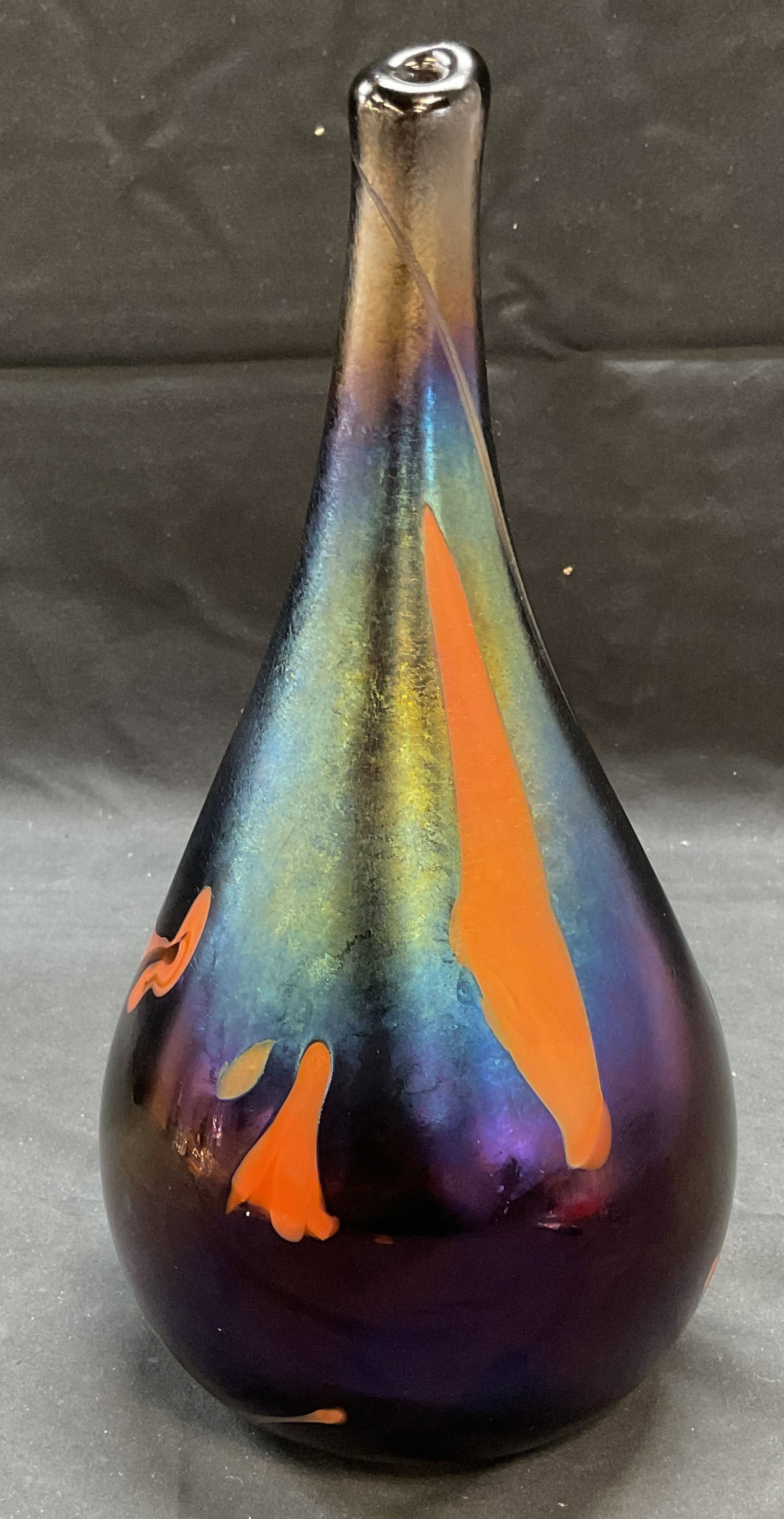 1976 Brian Lonsway Toledo Art Glass Vase: Vintage Brian Lonsway hand blown art glass Toledo vase. Iridescent blue with bronze and orange tones. Signed on underside. Dated 1976. Measures approx. 5 x 10.5 inches. Some scratching observed. Brian