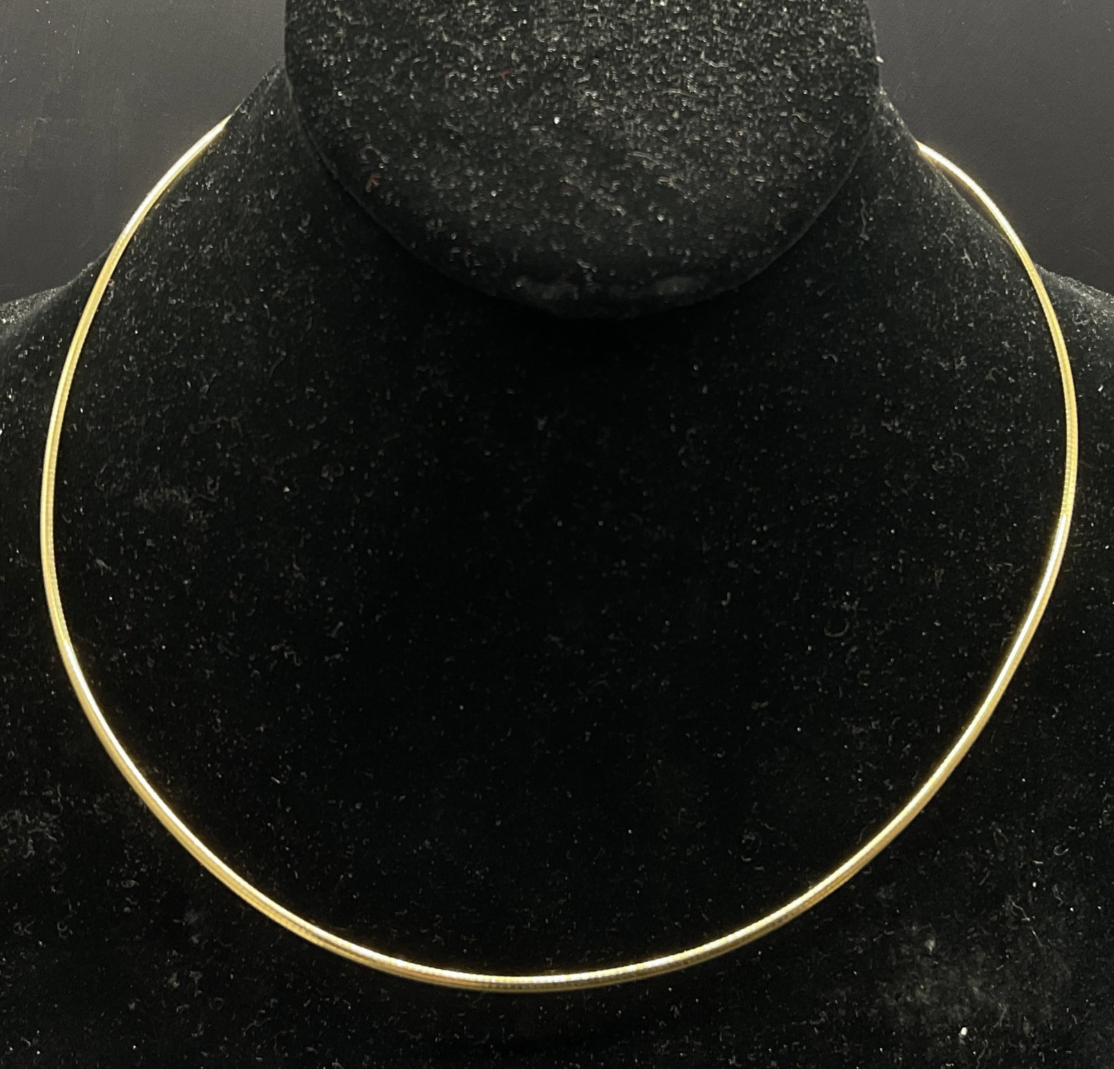 14KT Yellow Gold Adjustable Choker Necklace, Italy: 14KT Yellow Gold Adjustable Choker Necklace. Tubular chain. Marked 14KT ITALY. Adjustable length. Heart motif charms adjacent to clasp. Necklace length measured end to end approx. 19.5 in. Total weigh
