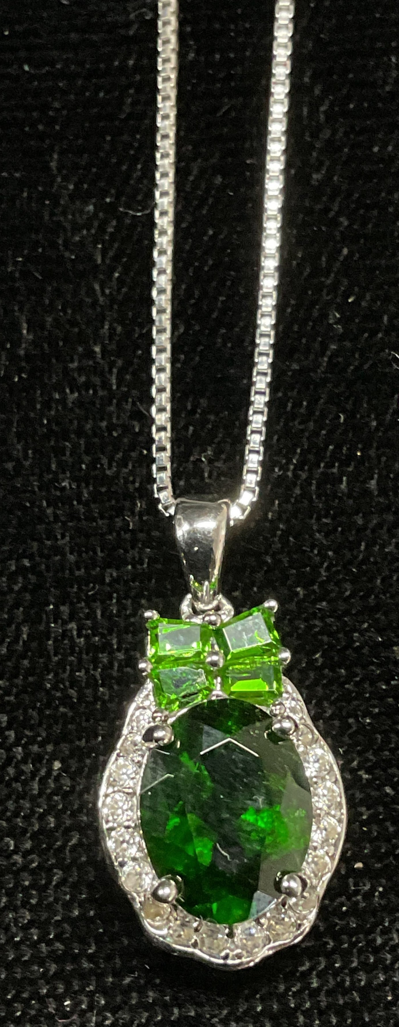 BBJ Sterling Silver Semiprecious Pendant Necklace: BBJ Sterling silver pendant necklace green and colorless semiprecious stones. Marked 925 and signed BBJ on clasp and pendant. Drop length approx. 9.5 inches. Pendant measures approx. 5/8 inches long. 