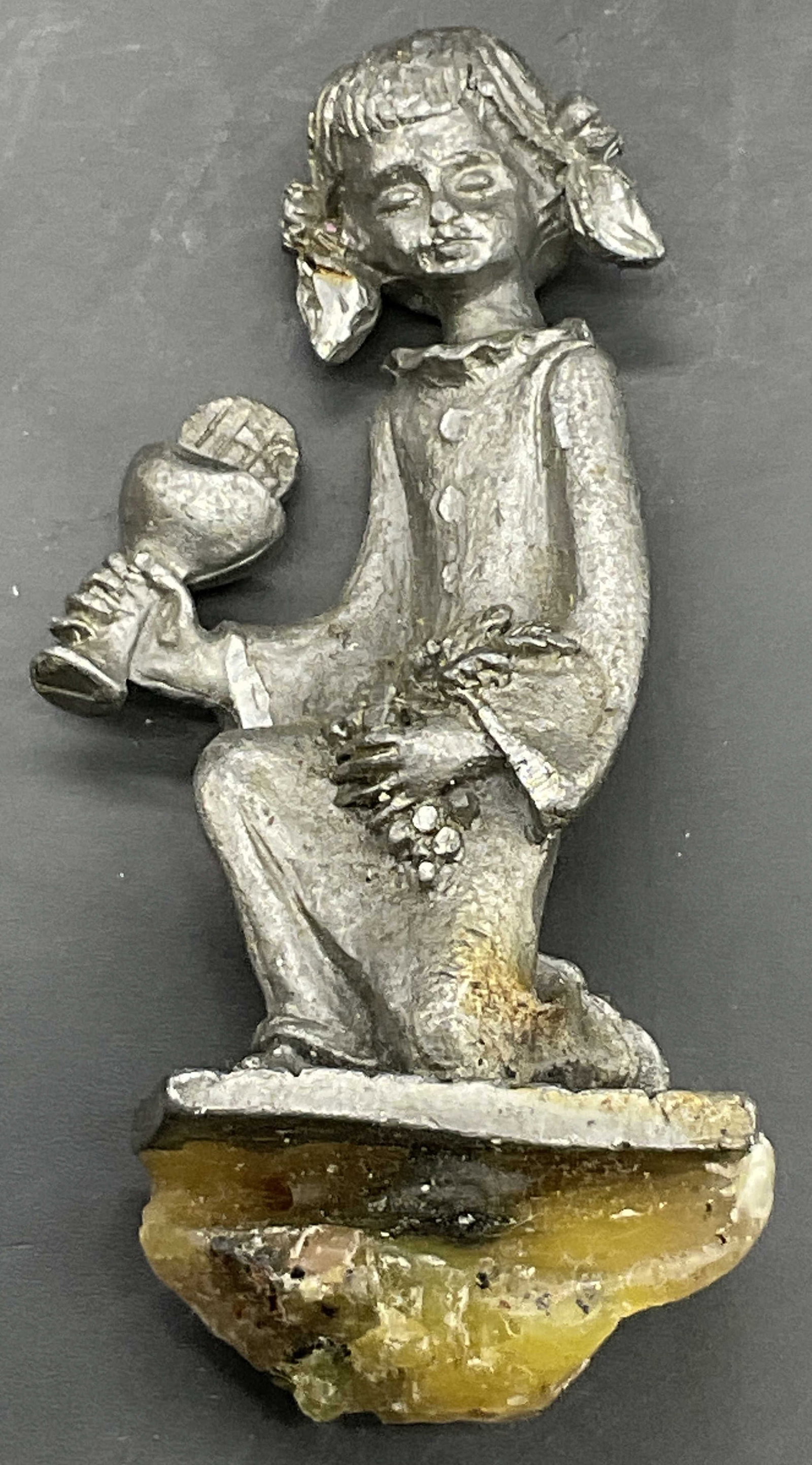 Vintage Silver Tone Metal Girl On Stone Figural: Vintage Silver Tone Metal Girl On Stone Figural. Measures approx. 3L x 1.25W in. Surface wear consistent with age, use, and exposure. Discoloration present. home decor, home accents, homewares, housew