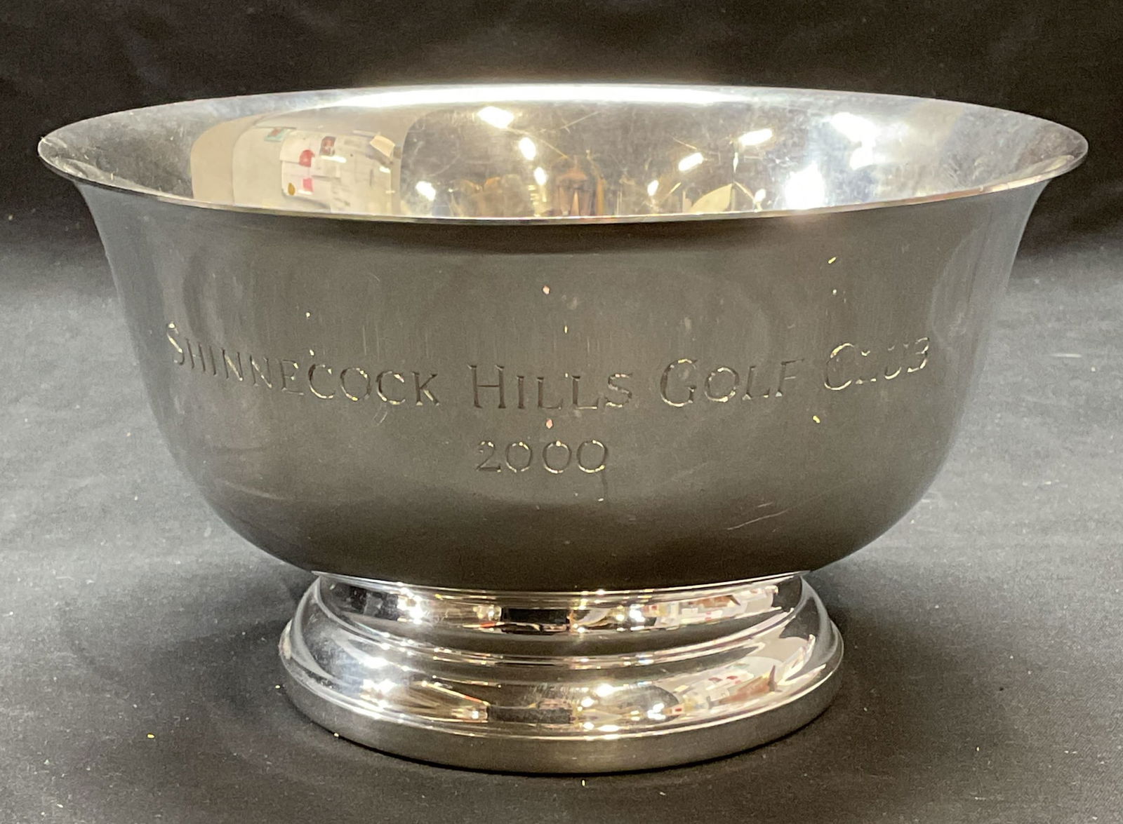 Tiffany & Co Pewter Paul Revere Bowl: Tiffany & Co pewter bowl. Paul Revere style shape with stepped footed base and fluted rim. Signed on underside. Engraved on exterior, Shinnecock Hills Golf Club 2000. Measures approx. 7 x 3.75 inches.