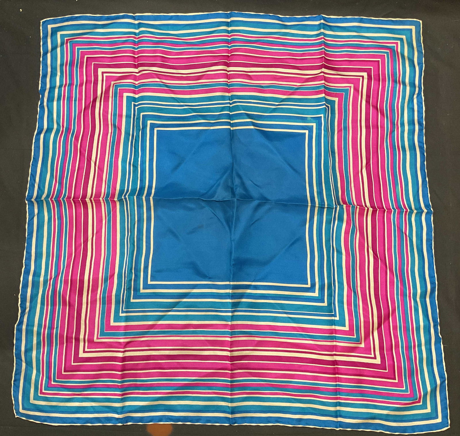 Vtg Saks Fifth Ave Blue Purple Silk Scarf, Italy: Vintage Saks Fifth Avenue silk scarf with blue and purple square design. Made in Italy. Measures approx. 26 x 26 inches. Some wear to material including blemishes observed. Saks fifth Avenue scarf, de