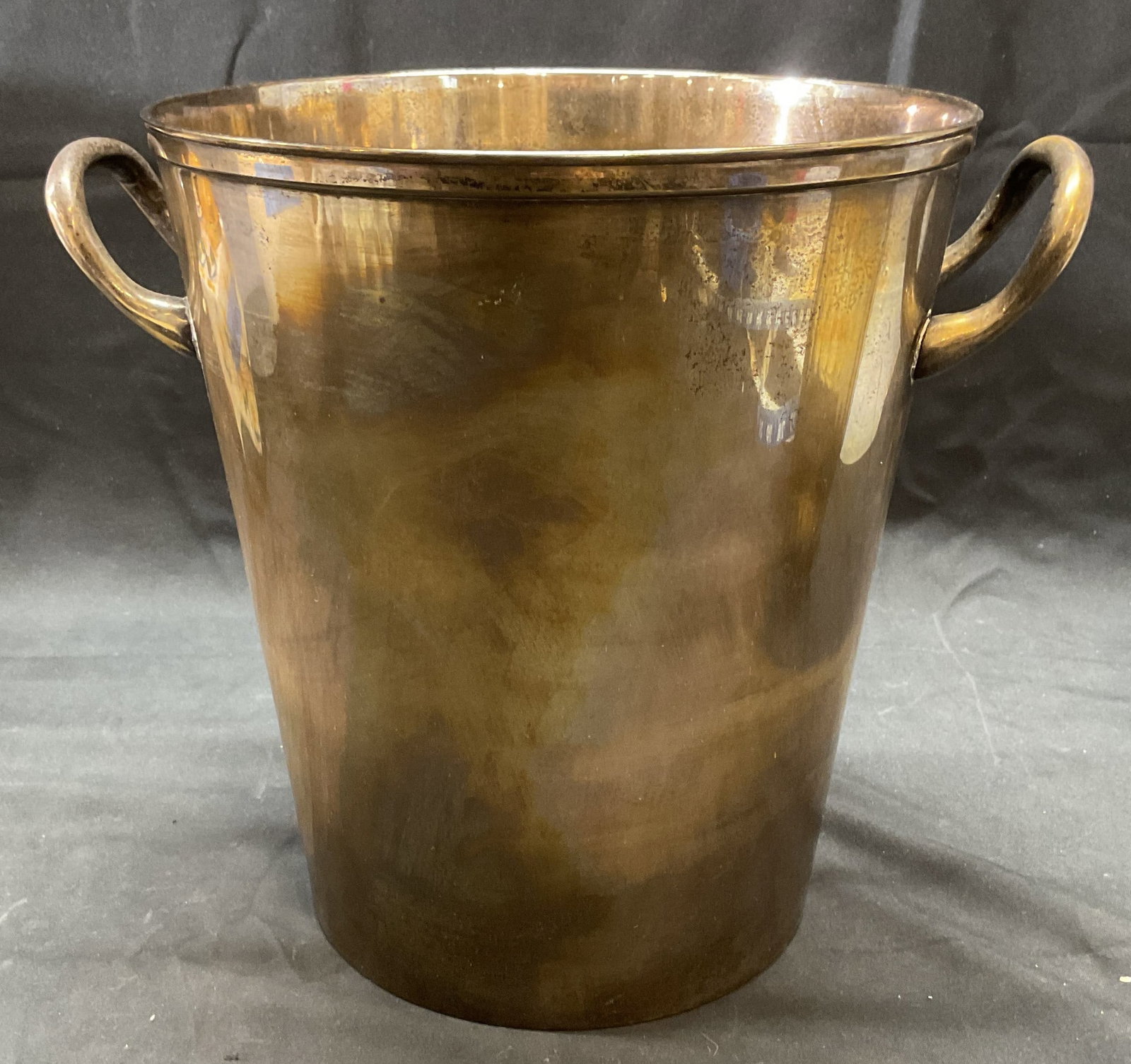 Pottery Barn Silver Plated Ice Bucket: Pottery Barn silver plated ice bucket with handles. Signed on underside. Measures approx. 8 x 9 inches. Some surface wear including scratching and patina observed. Pottery barn ice bucket, ice bucket,