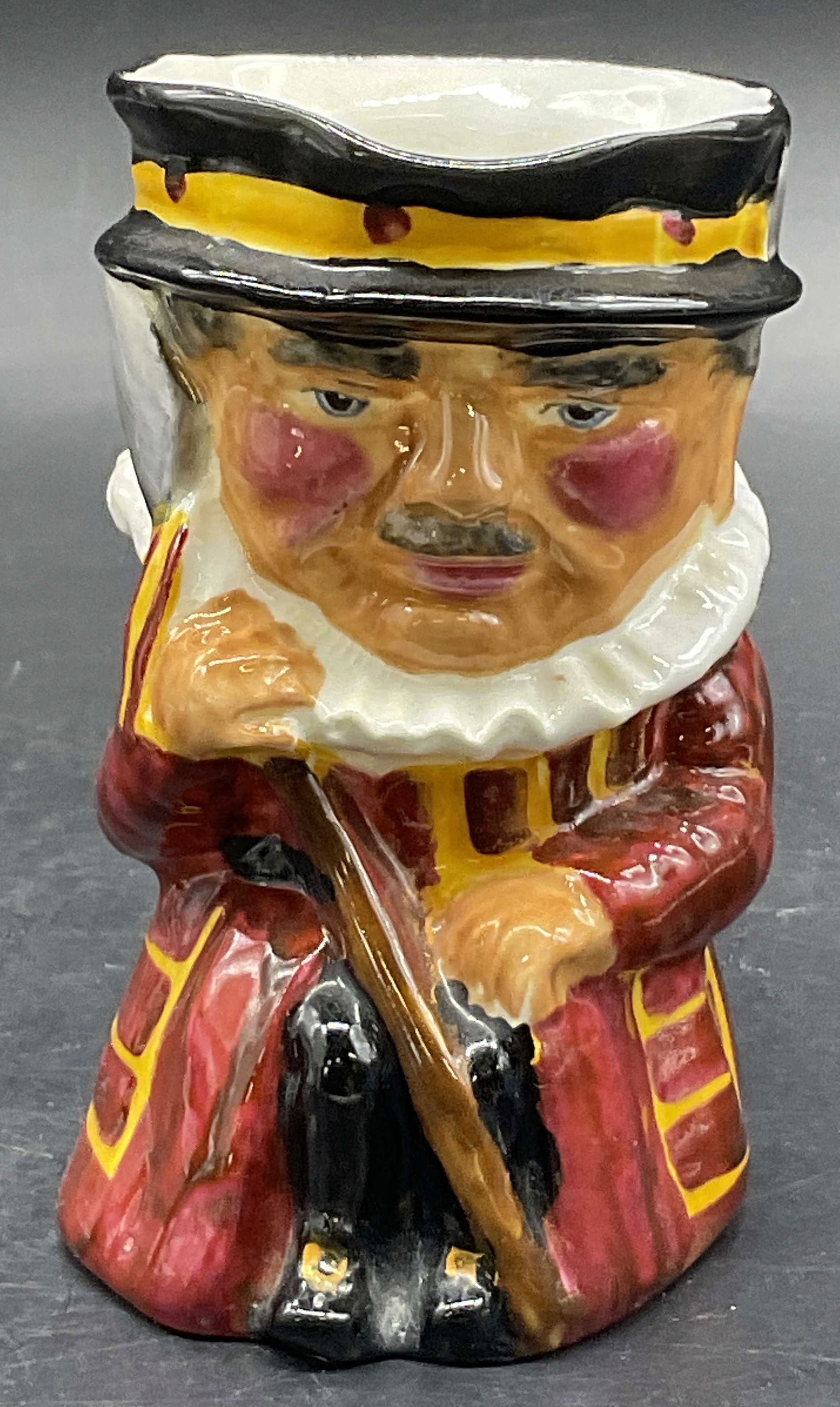 THORLEY Vintage Bone China Figural Creamer, Eng: THORLEY Vintage Bone China Figural Creamer. Underside signed THORLEY BONE CHINA, MADE IN ENGLAND, BEEFEATER. Measures approx. 3.25W x 4H in. Width includes handle. Crazing and surface wear present. ho