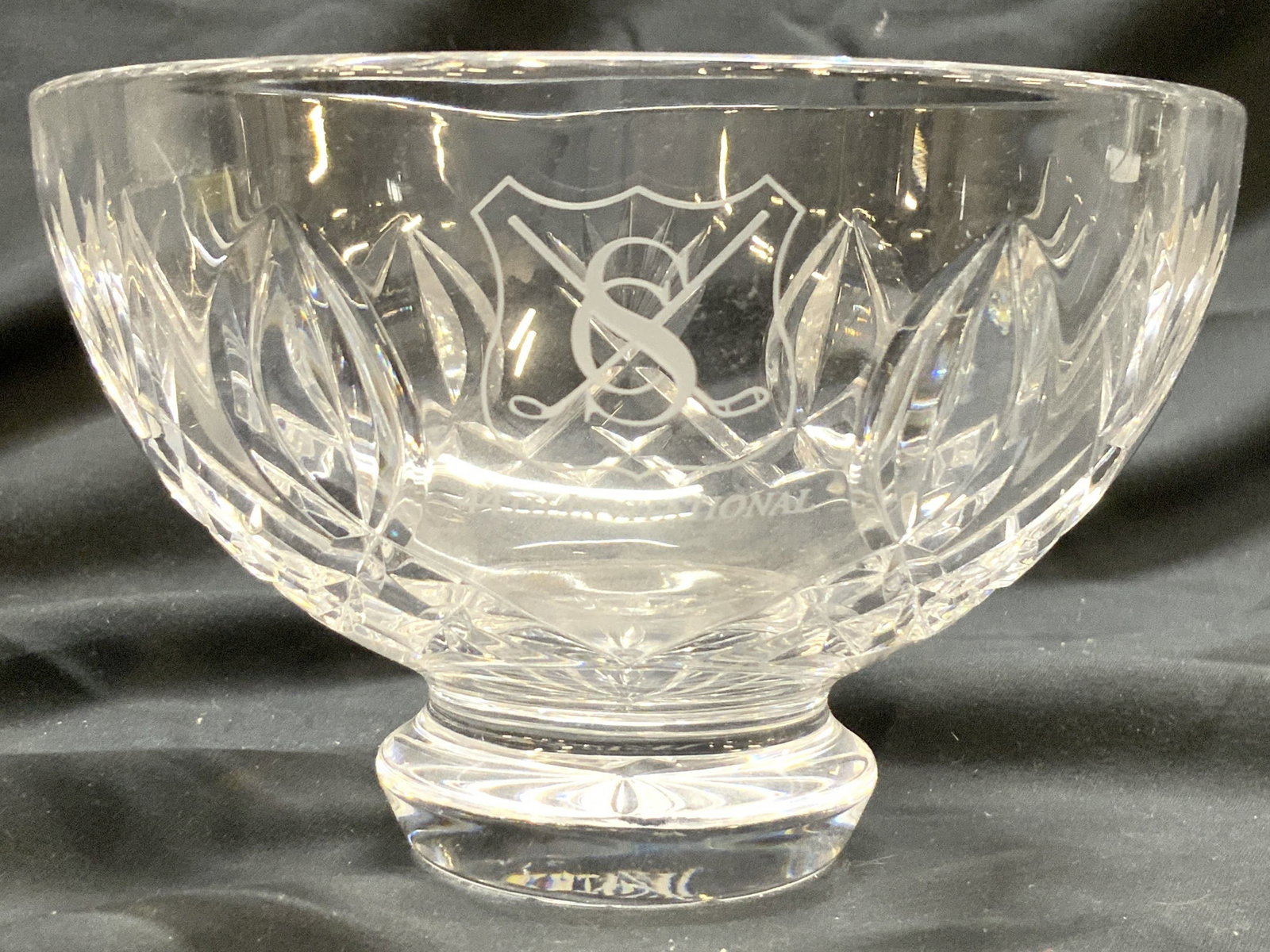 WATERFORD Monogrammed Crystal Bowl: Underside is marked WATERFORD. Bowl is monogrammed 44th INVITATIONAL. Bowl is crystal. Piece has geometric relief detail. Bowl is footed. Piece measures approximately 4 inches tall 6 inches diameter. 