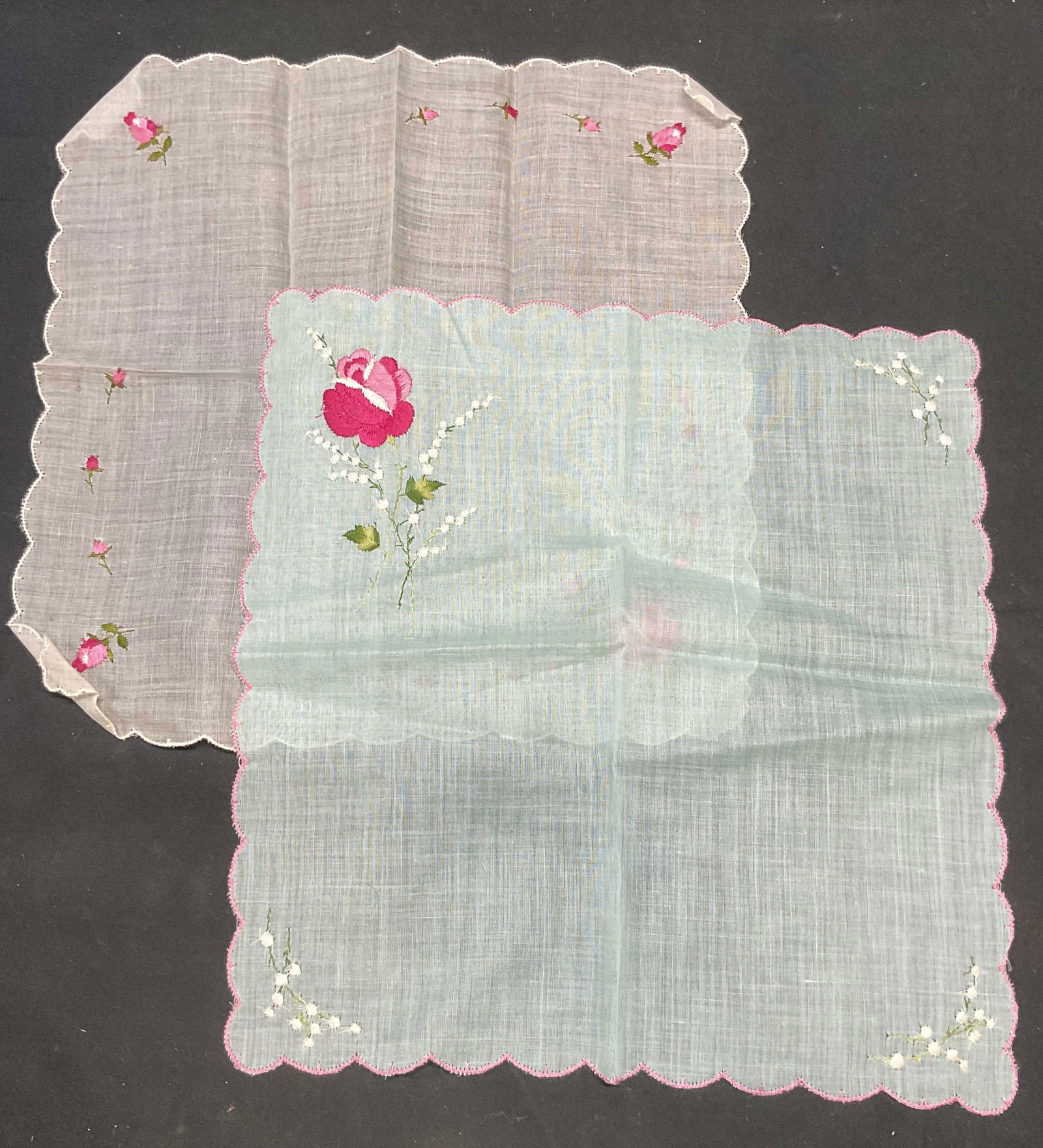 Lot 2 Vtg Embroidered Floral Cotton Handkerchiefs: Lot of 2 vintage handkerchiefs with embroidered designs. White and blue, material feels like cotton. Sizes vary slightly. Measure approx. 10.5 x 10.5 inches. Both pieces have some wear to material con