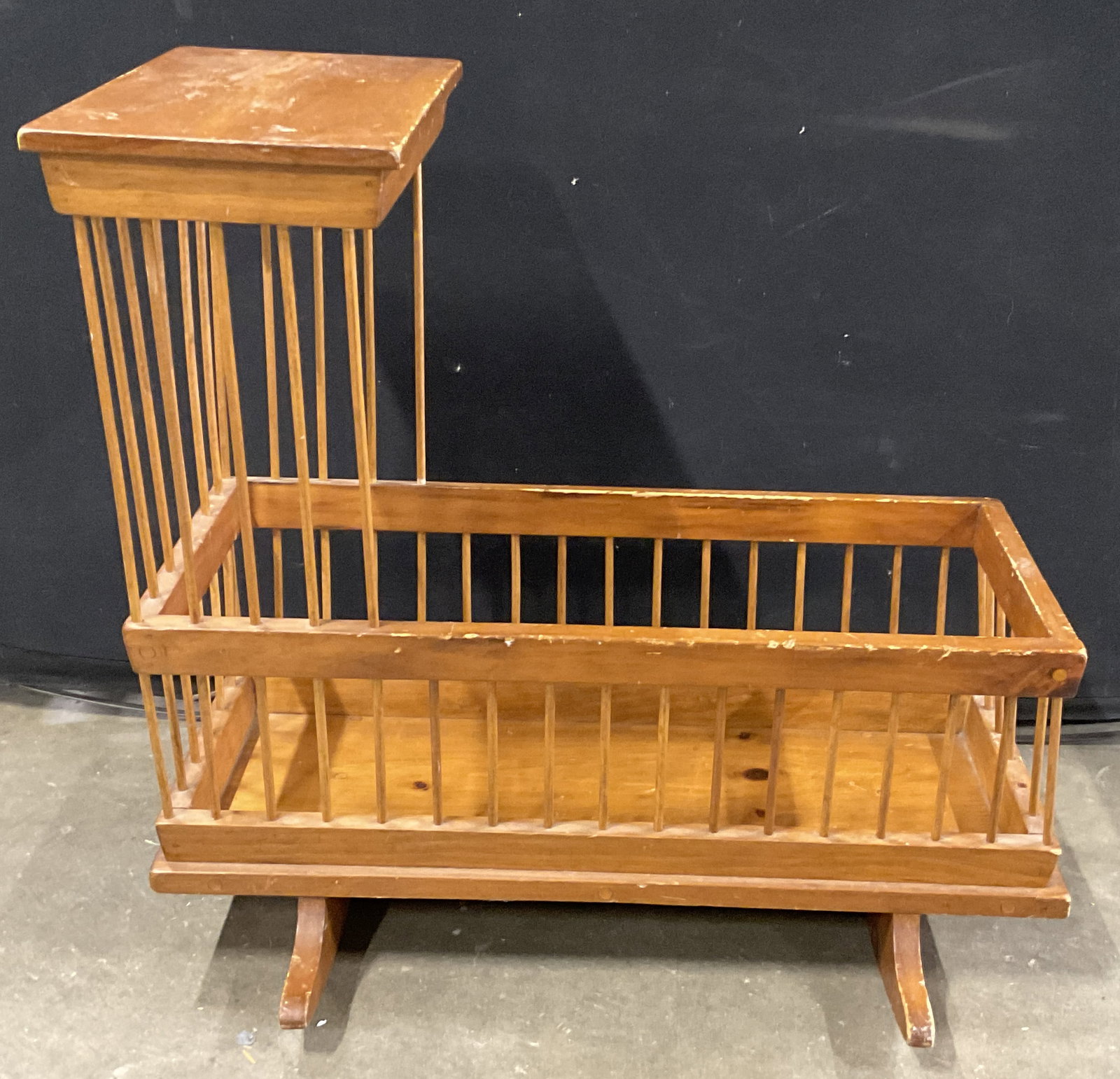Vintage Wooden Rocking Baby Doll Crib: Vintage Wooden Rocking Baby Doll Crib. Spindle bars. Measures approx. 24H x 24.5W x 14.25D in. Depth measured across the top. Surface wear, discoloration, and losses to wood present. home decor, home 