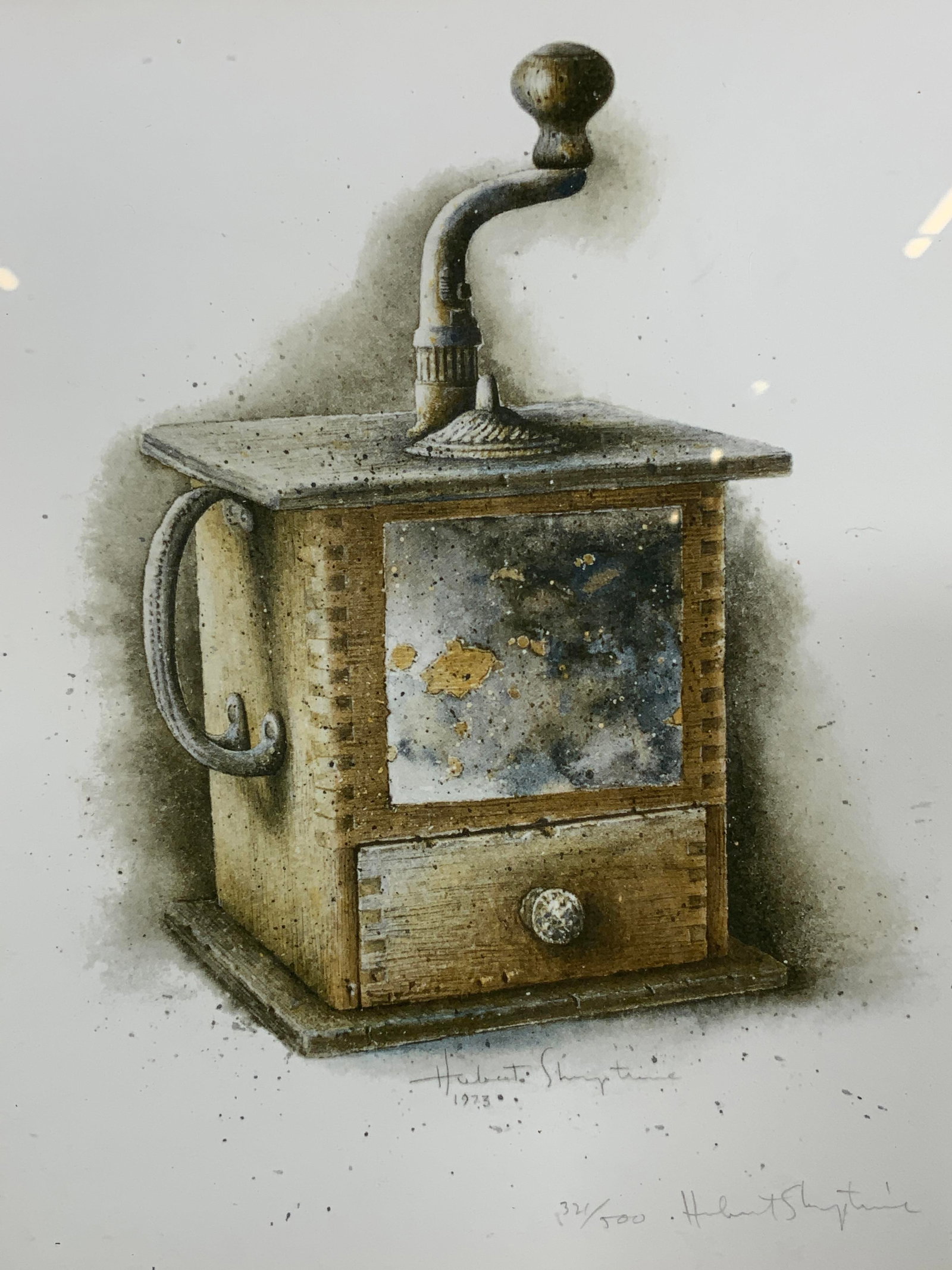 Hubert Shuptrine Sgnd Ltd Ed Coffee Grinder Litho: Lithograph on paper. Art after Hubert Shuptrine. Signed in lower right corner. Dated 1973. Limited edition number 321/500. Subject depicts an antique coffee grinder. Framed in a brown wooden frame wit
