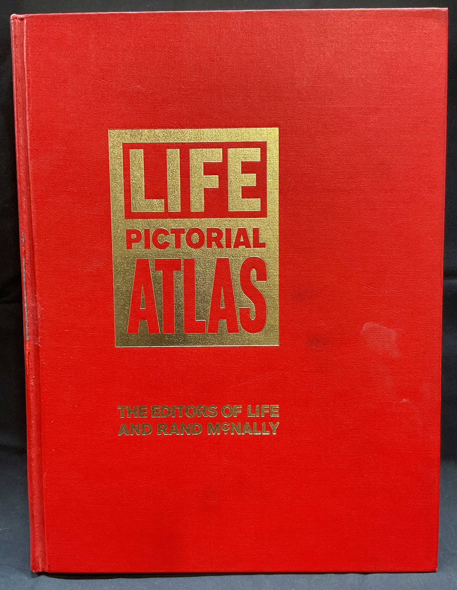 1961 Life Pictorial Atlas, Illustrated: Hardcover copy of Life Pictorial Atlas. Published by Life/Rand McNally, 1961. Illustrated. Includes sleeve. Measures approx 14 x 10.5 inches. Wear to cover, pages, and binding consistent with exposure