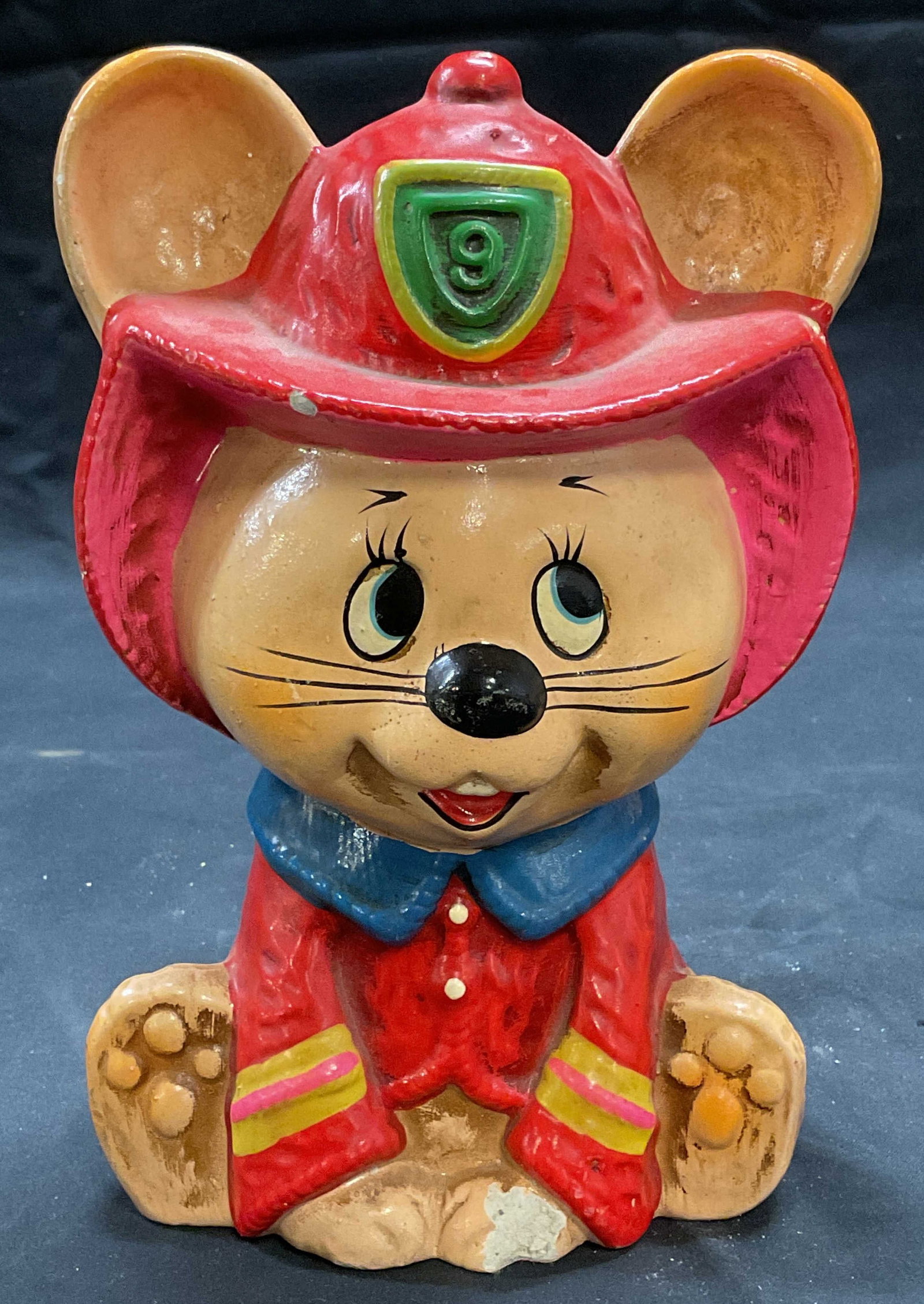 Vintage Hallmark Fireman Mouse Bank: Vintage Hallmark fireman mouse motif coin bank. Paper mache. Hand painted. Measures approx. 4.75 x 3.25 x 7.75 inches. Wear including chips and loss to paint observed. Fireman coin bank, mouse coin ba