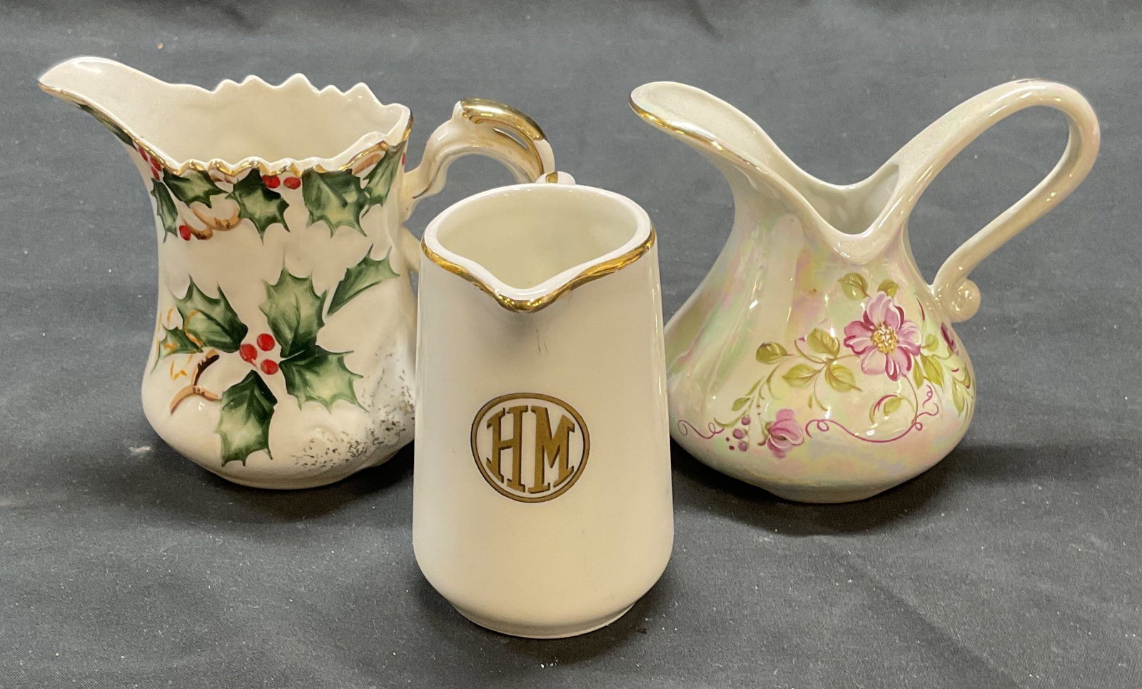 Lot 3 Vtg Signed Porcelain Creamer, France +: Lot of 3 signed vintage porcelain creamer. LEFTON China hand painted with holly motif. St Martin Lusterware floral motif, Limoges, France. Renaud & J Clermont gilt monogram HM, Nice, France. Largest m