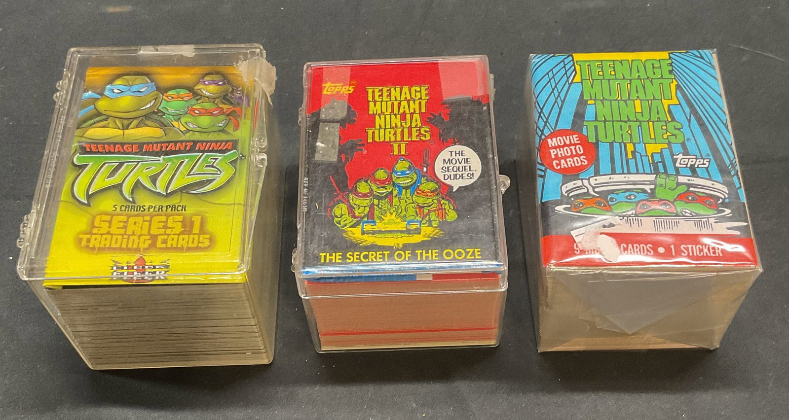 Group Teenage Mutant Ninja Turtles Trading Cards: Group lot of 100+ pieces of Teenage Mutant Ninja Turtles trading cards. Cards measure approx. 3.5 x 2.5 inches each. Not examined individually or for set completion. All pieces As Is, may have some we