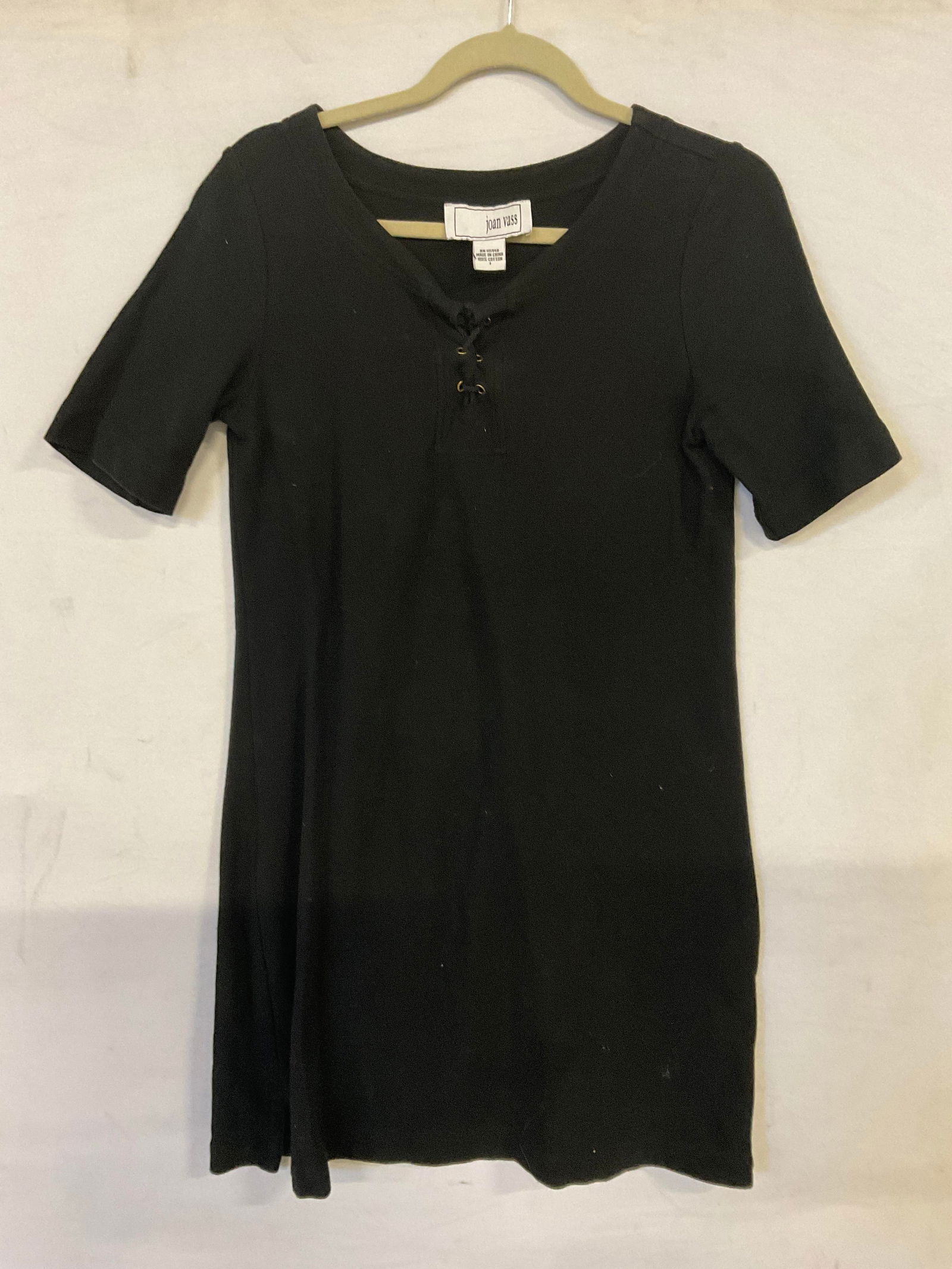 JOAN VASS 100% Cotton Black Dress: JOAN VASS 100% Cotton Black Dress. Brand tag reads JOAN VASS. Material tag reads 100% Cotton, 1. Length measured flat approx. 33 inches. Measured 16 inches across chest, measured flat. Surface wear co