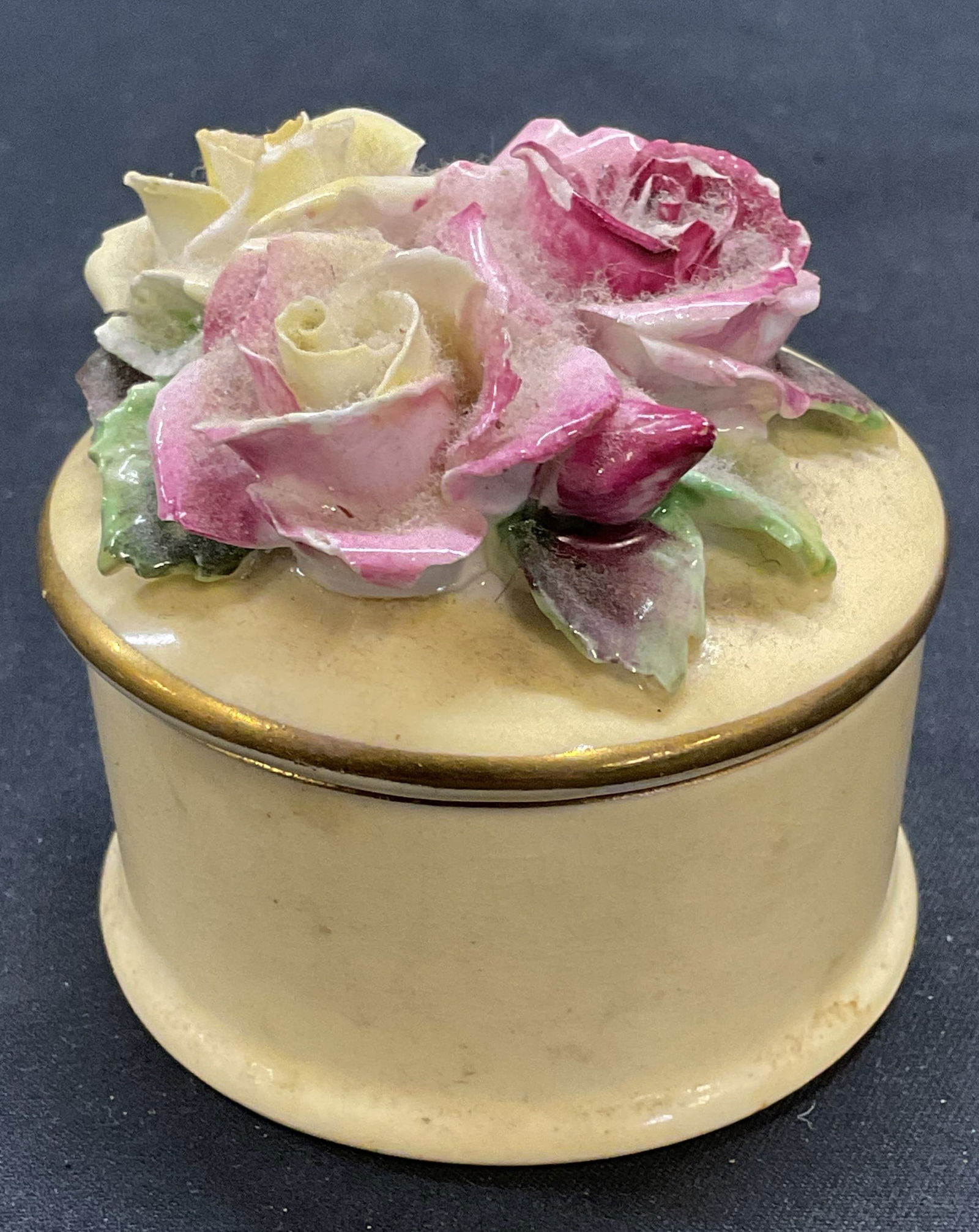 Vtg Crown Staffordshire Floral Trinket Box England: Vintage Crown Staffordshire bone china trinket box with raised floral design. Signed on underside. Made in England. Measures approx 2.25 x 2.25 inches. Some wear including scratching and small chips.