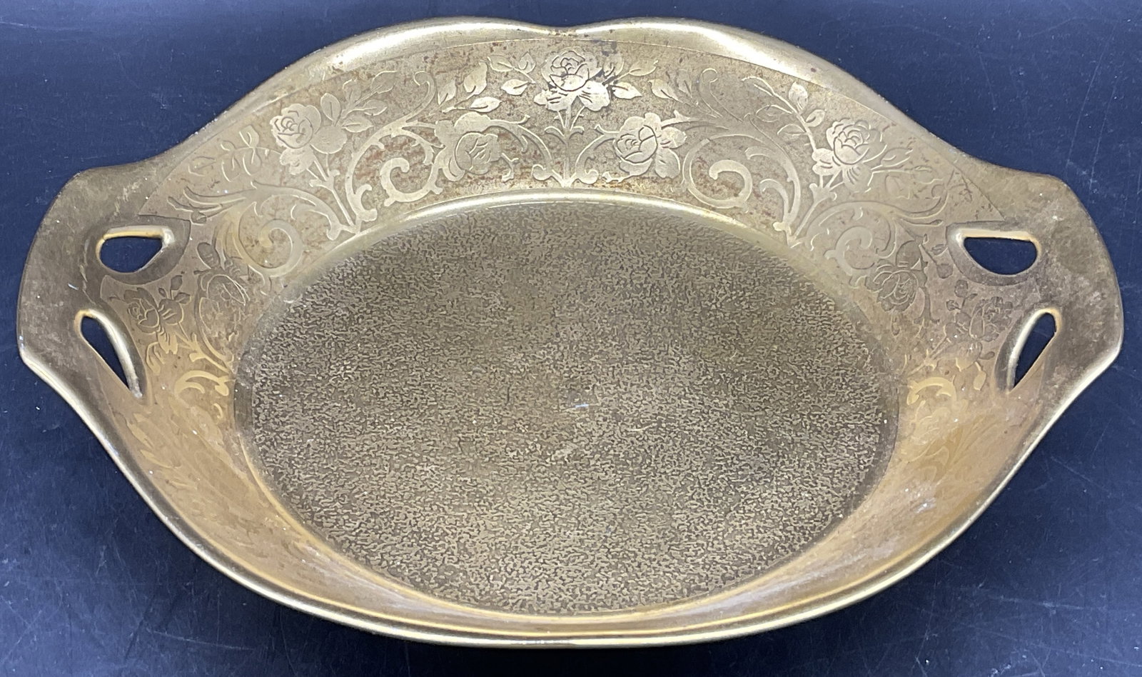 RS TILLOWITZ Signed Handled Gilt Porcelain Dish: RS TILLOWITZ Signed Handled Gilt Porcelain Dish. Floral motif to the piece. Pierced porcelain work handles. Measures approx. 1.5H x 7.5W in. Underside signed RS TILLOWITZ, other verbiage illegible. Di