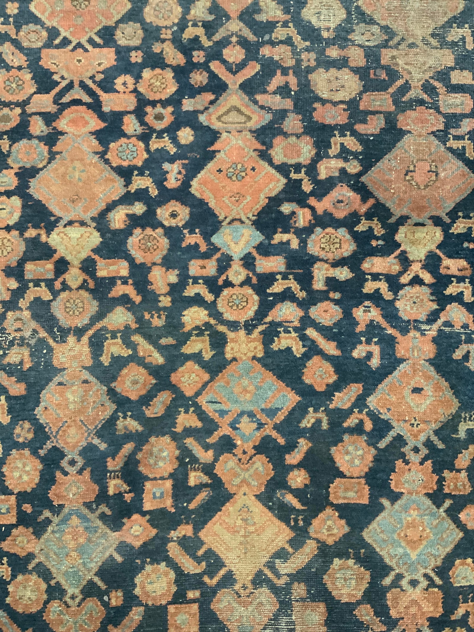 Antique Handmade Persian Wool Area Rug: Rug is handmade and wool. Piece appears to be antique. Persian rug with intricate multi toned geometric & floral detail. Rug measures approximately 76 inches long 52 inches wide. Rug, carpet, area rug