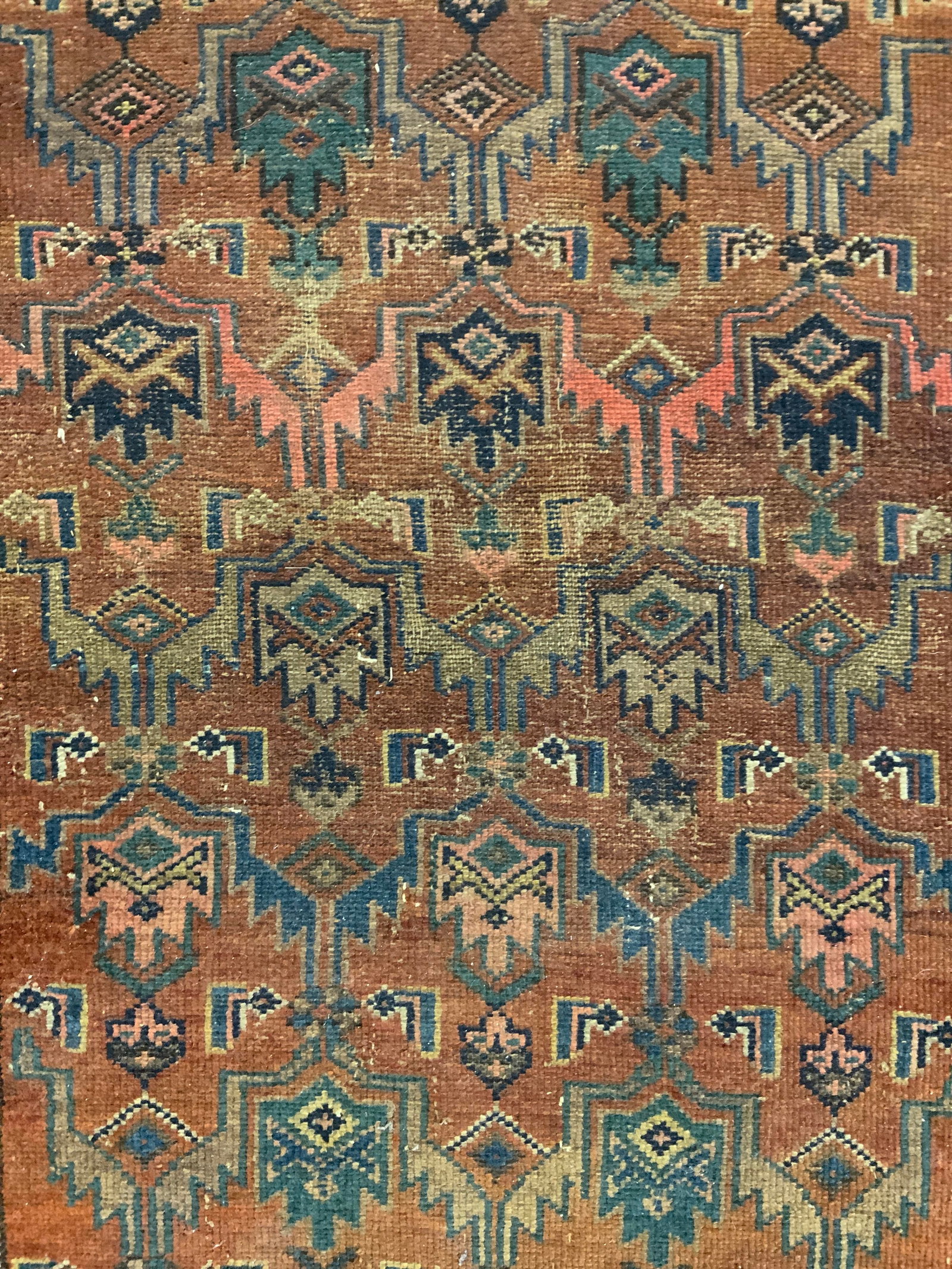 Antique Handmade Persian Wool Area Rug: Rug is handmade and wool. Piece appears to be antique. Persian rug with intricate multi toned geometric & floral detail. Rug measures approximately 72 inches long 47 inches wide. Rug, carpet, area rug
