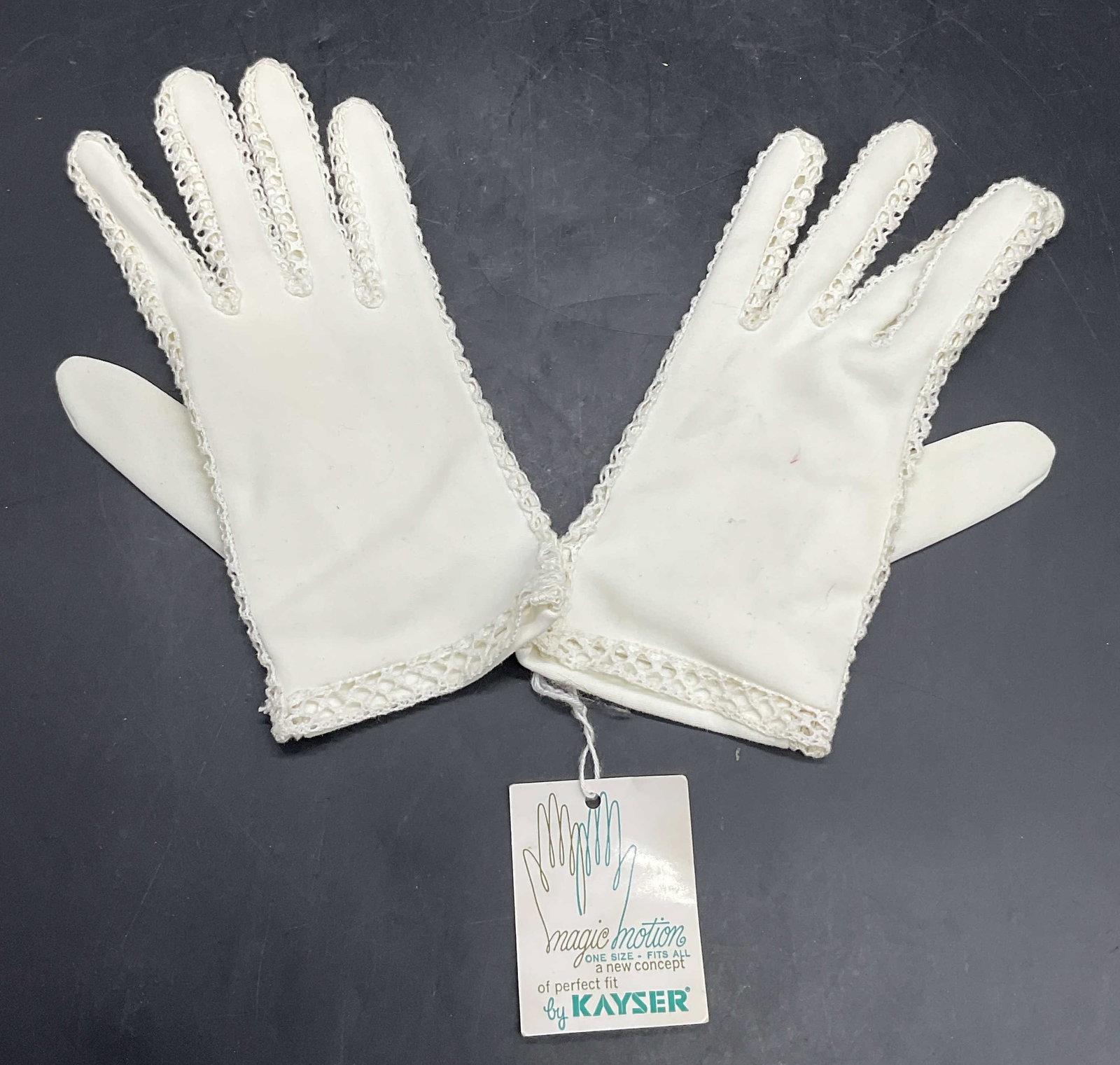 KAYSER NWT Vintage 100% Nylon Gloves, Original Tag: KAYSER NWT Vintage 100% Nylon Gloves. Original Tag attached. Original tag reads KAYSER. Tag to interior reads 100% Nylon, Fits All. White hued gloves. Measures approx. 7.5L x 3.25W in. Discoloration, 