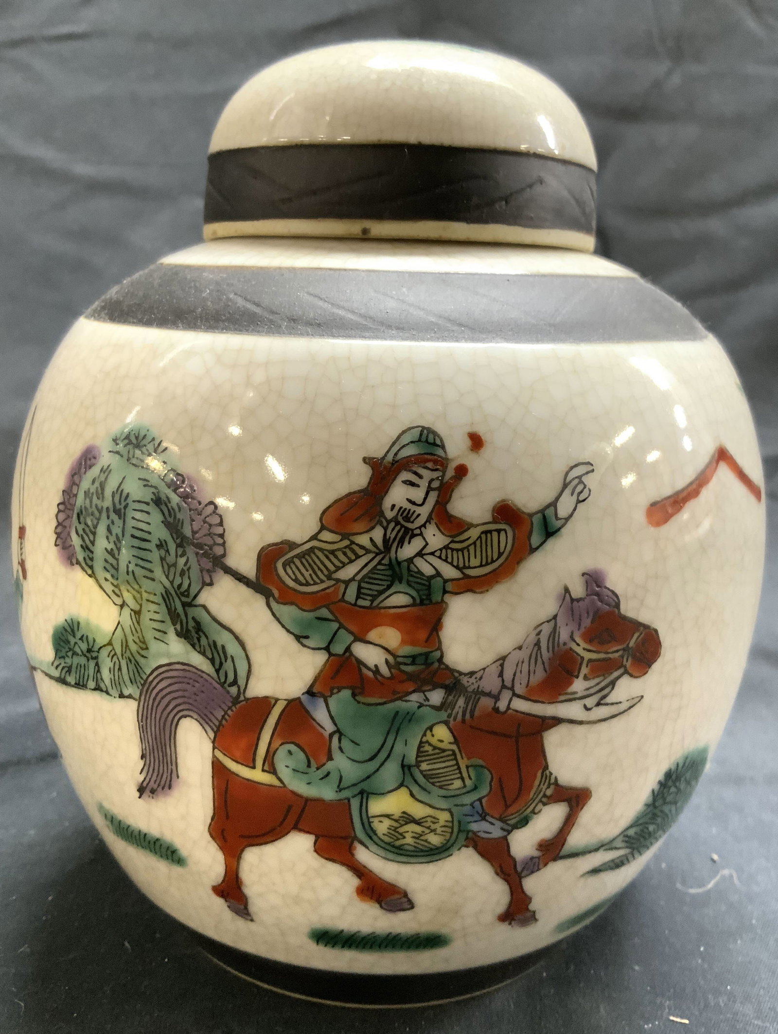 Signed Vntg Hand Painted Asian Porcelain Urn: Underside has inscription signature with Asian characters. Piece is vintage and porcelain. Urn has hand painted battle scenes derail with figures with weapons & riding horses. Vessel includes lid. Pie