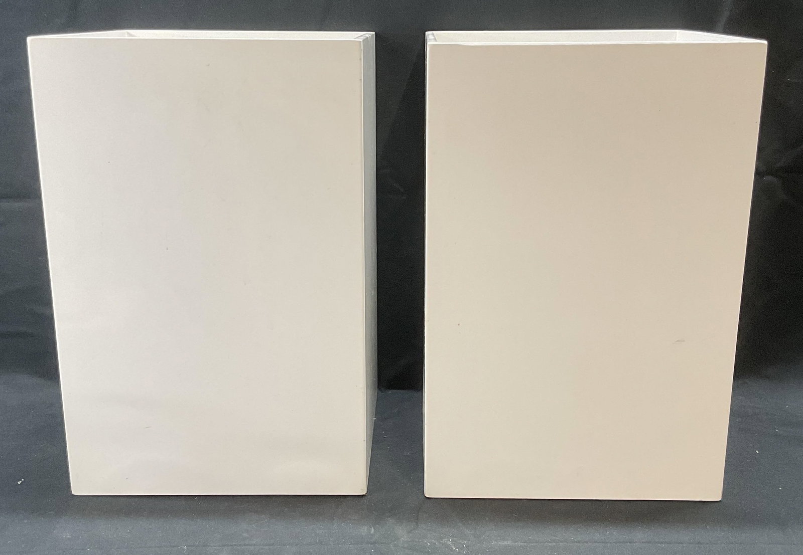 Pair White Square Vessels/Bins: Pair of white square shaped vessels or bins. Composite material. Measure approx. 8 x 8 x 11.75 inches each. Both pieces have some surface wear including scratching observed. White bin, white vessel, s