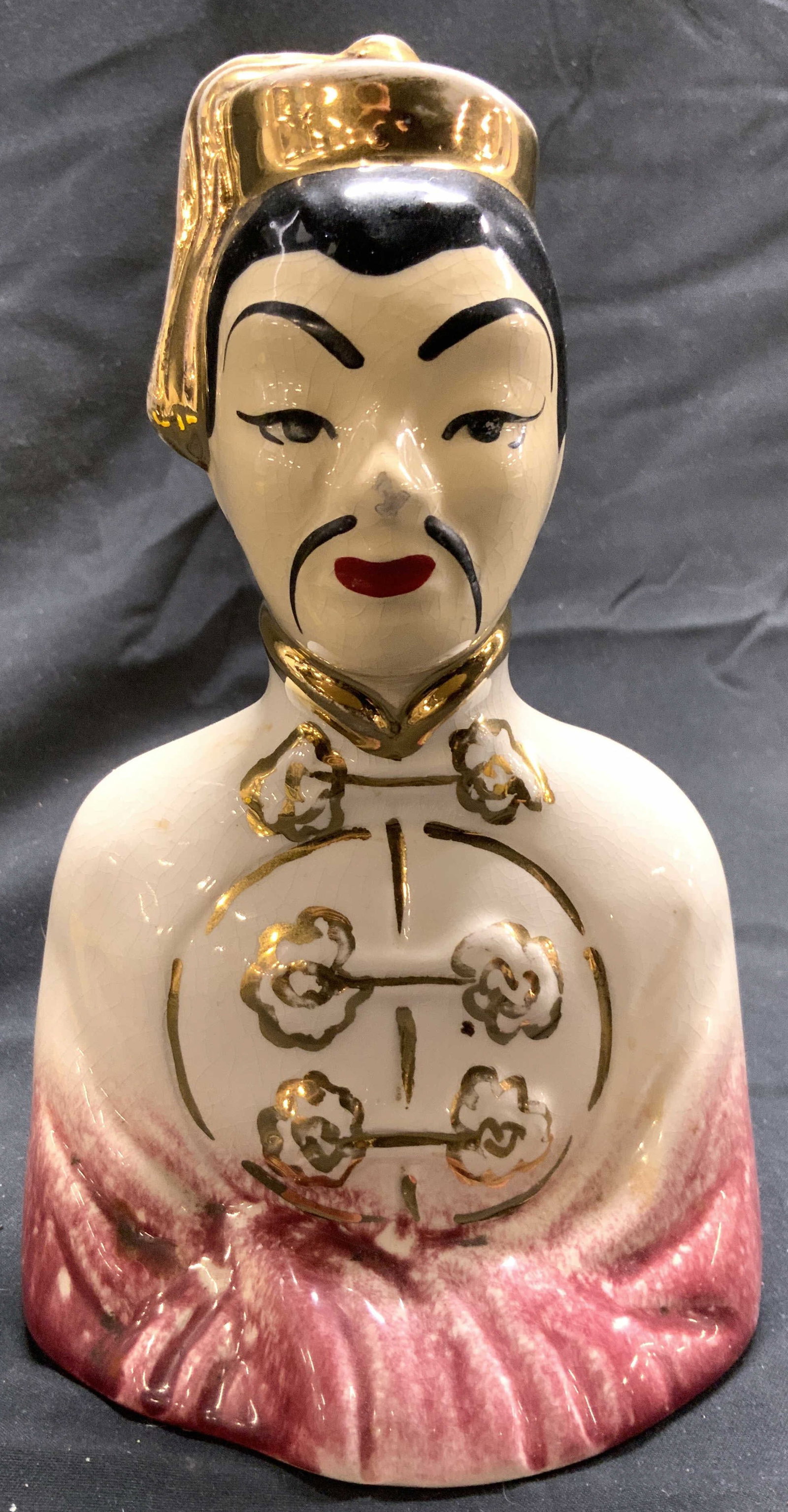 Vntg Hand Painted Asian Male Figure Porc Bust: Bust is porcelain. Piece is Vintage, appears to be hand painted. Depicts a male figure in traditional Asian attire. Piece has some gilt detailed areas. Bust measures approximately 7 inches tall 4.25 i
