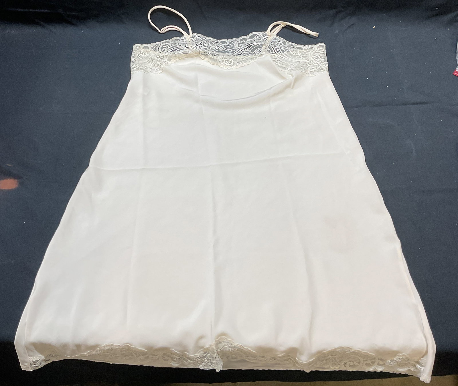 Vtg Wacoal Cream Satin Lace Slip Dress: Vintage Wacoal cream satin and lace trim slip dress. Size marked 36, 40 inches. Polyester. Some wear including small blemishes observed. Wacoal, Wacoal slip dress, designer slip dress, vintage slip dr