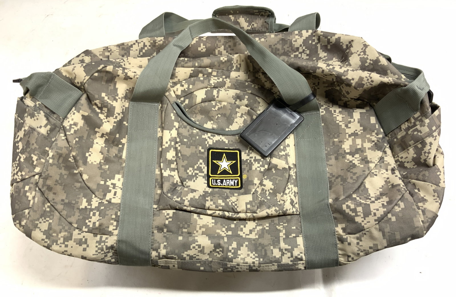 US ARMY Digi Camo Duffel Bag: Duffel bag has embroidered US ARMY logo. Piece has digital camouflage pattern. Piece has 3 outer pockets. Duffel bag measures approximately 18 inches tall with straps 24 inches wide 14 inches deep. Ba
