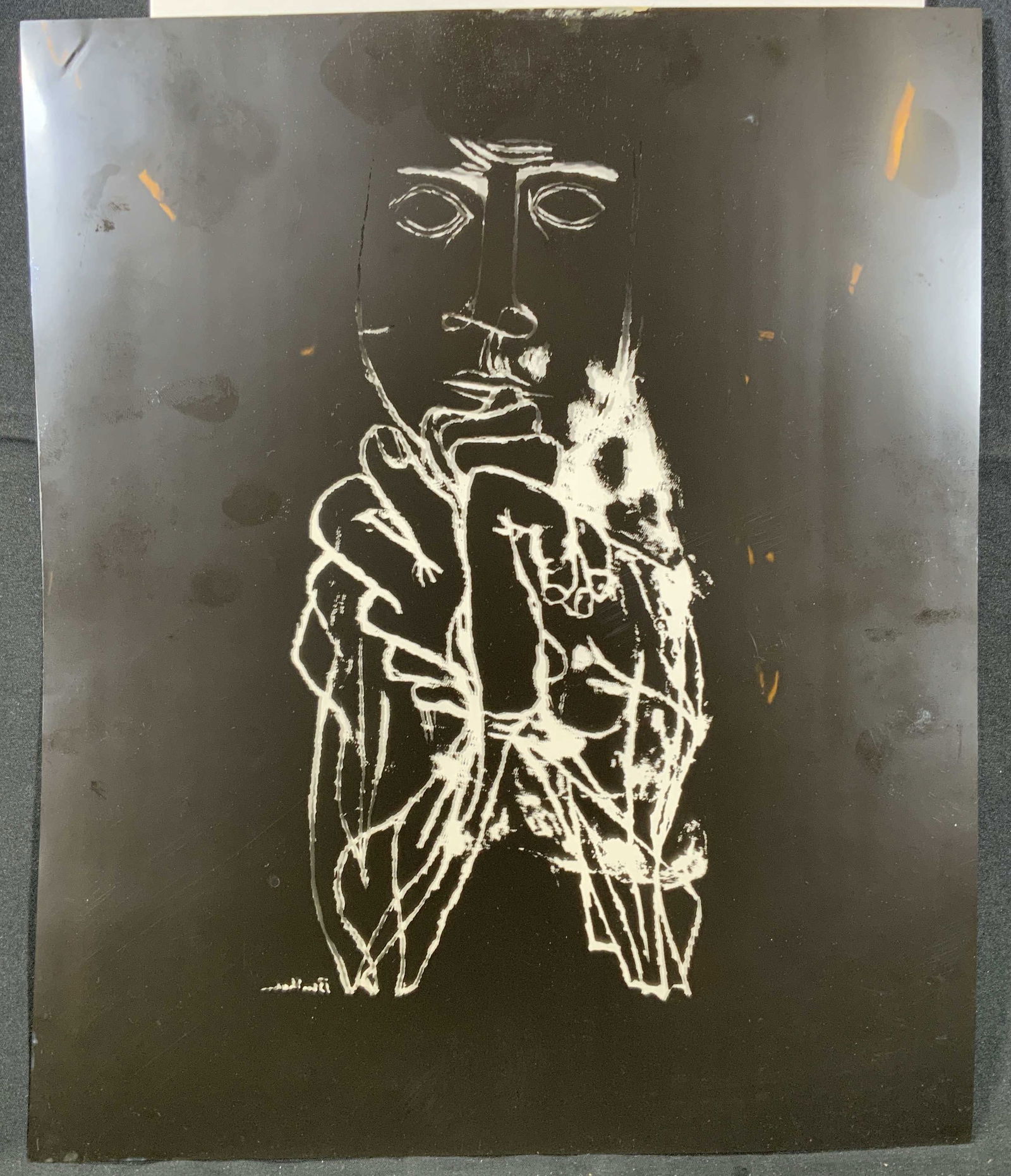 Signed Ben Shahn Clear Composite Negative Space Art: Back composite sheet with clear negative space. Signed in lower right corner. Signature appears to read Ben Shahn. Subject depicts an abstract figure with a face and two hands. Composite sheet measure